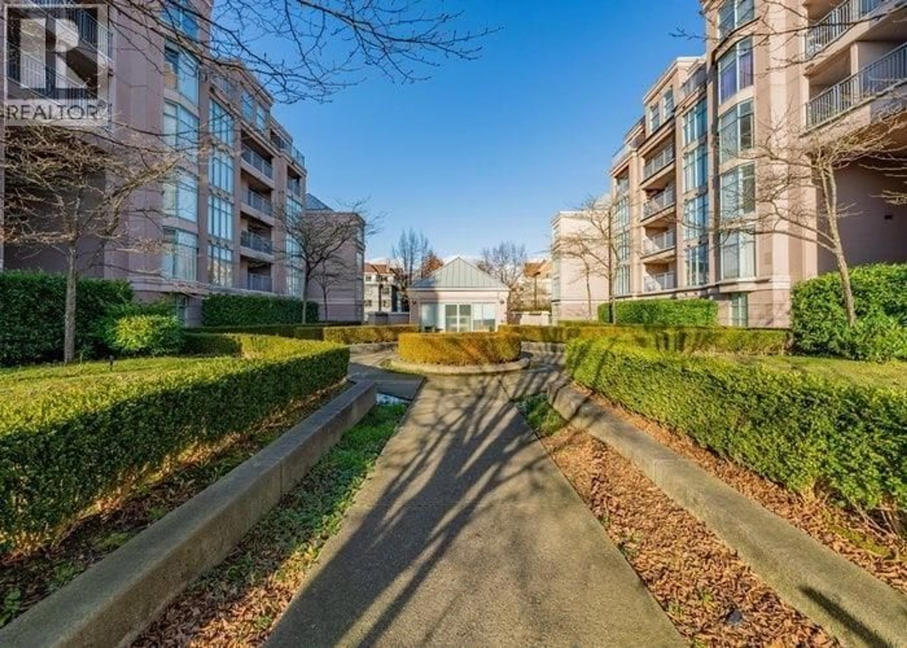 A pic from outside/outdoor area/front of a property/back of a property/a pic from drone, unknown for 203 - 2468 BROADWAY, Vancouver British Columbia V5M4V1