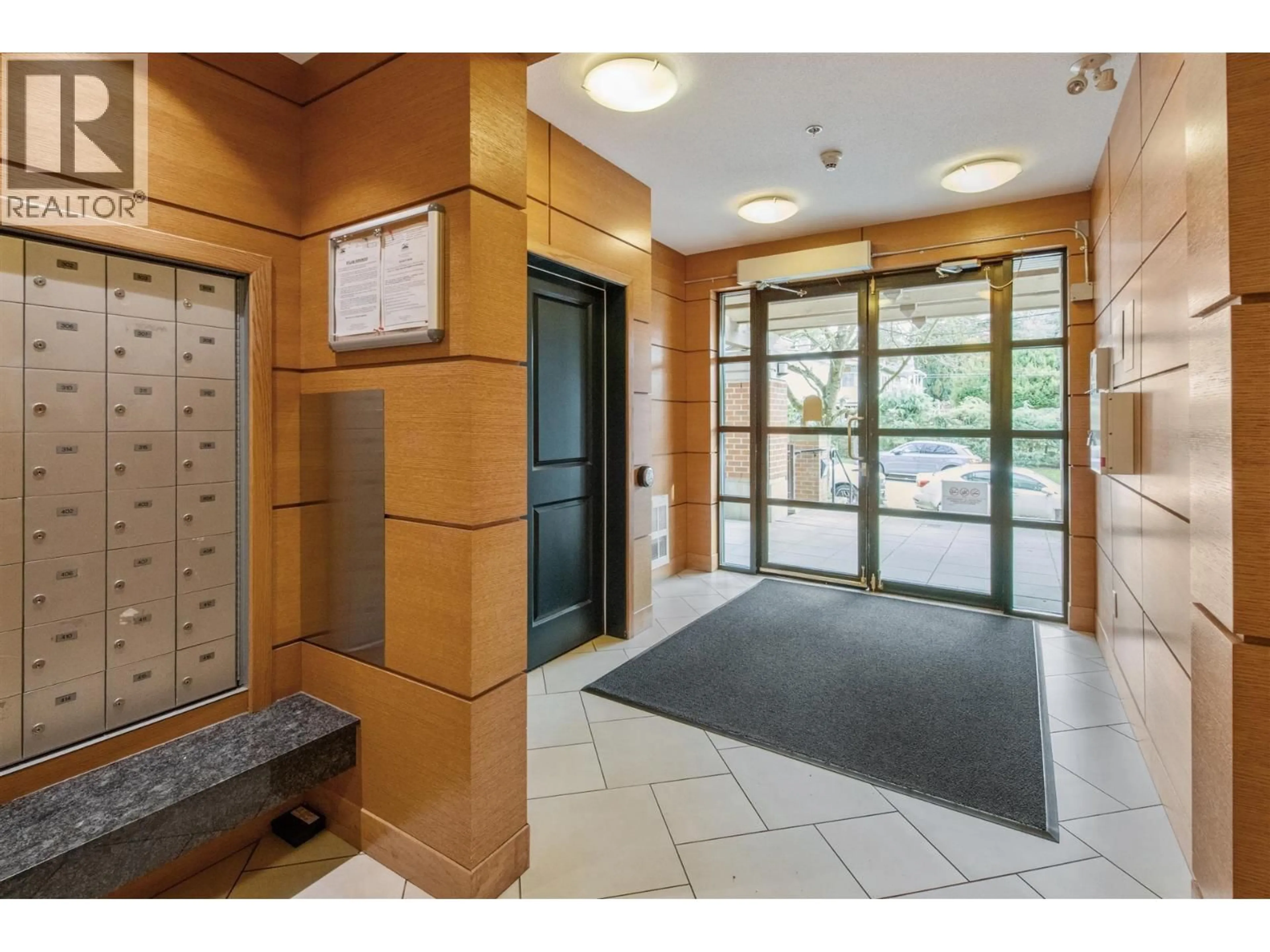 Indoor foyer for 408 - 3551 FOSTER AVENUE, Vancouver British Columbia V5R0A1