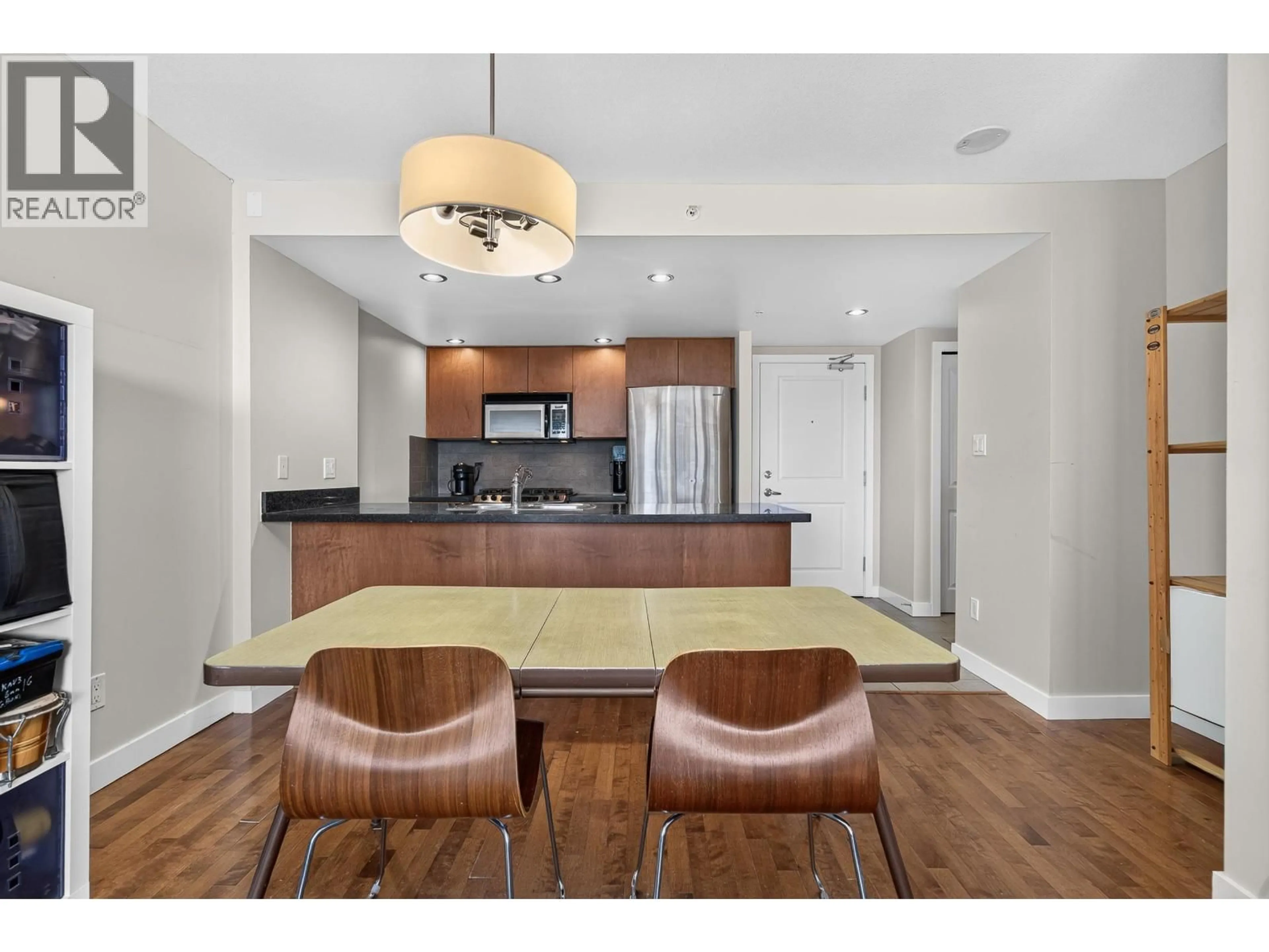 Open concept kitchen, wood/laminate floor for 907 - 6233 KATSURA STREET, Richmond British Columbia V6Y4K1