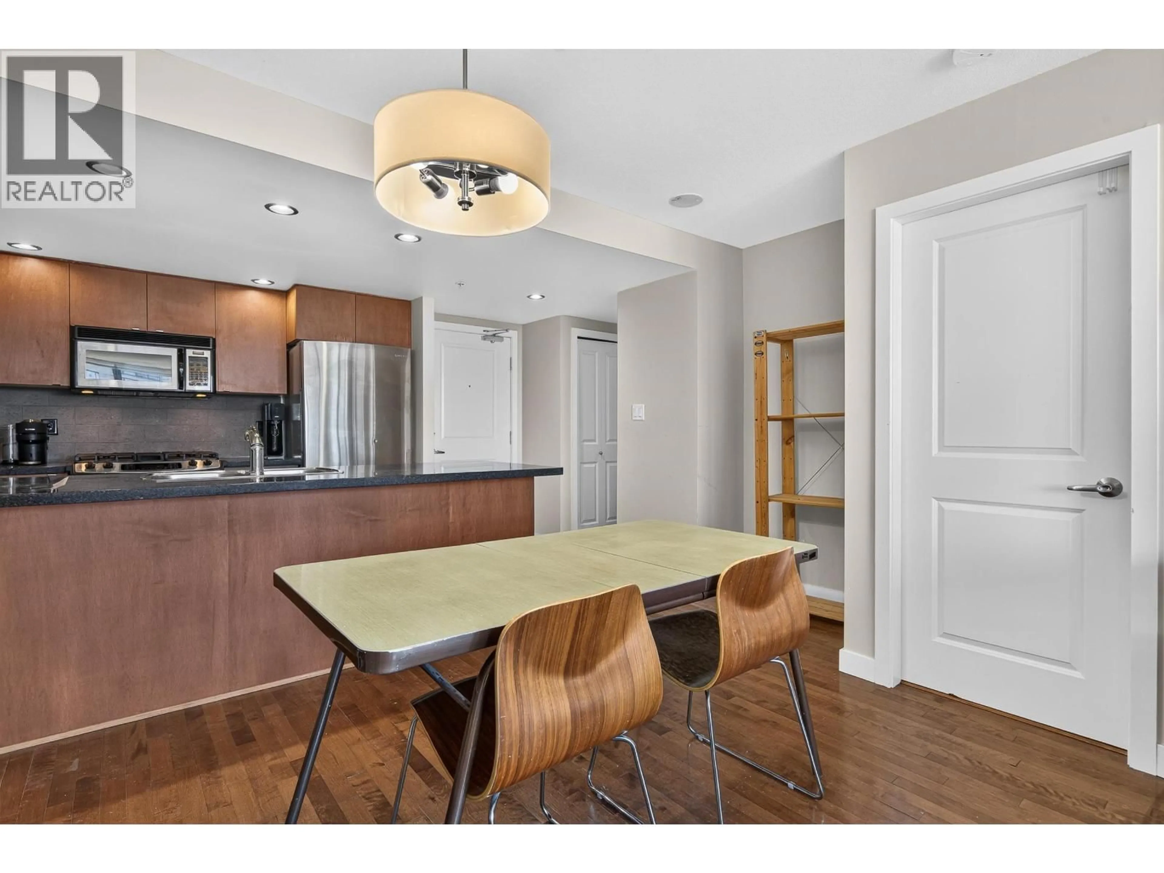 Open concept kitchen, wood/laminate floor for 907 - 6233 KATSURA STREET, Richmond British Columbia V6Y4K1