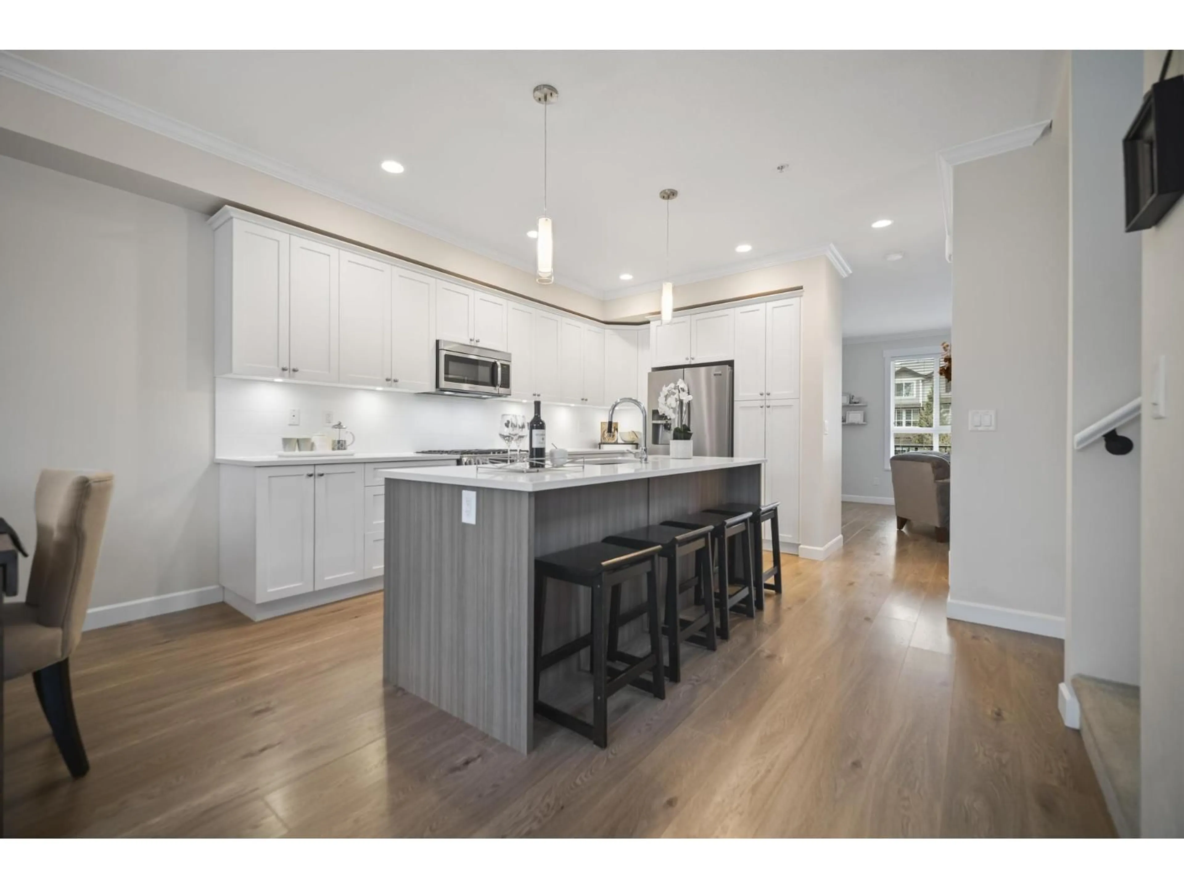 Open concept kitchen, wood/laminate floor for 9 - 7157 210 STREET, Langley British Columbia V2Y0T3