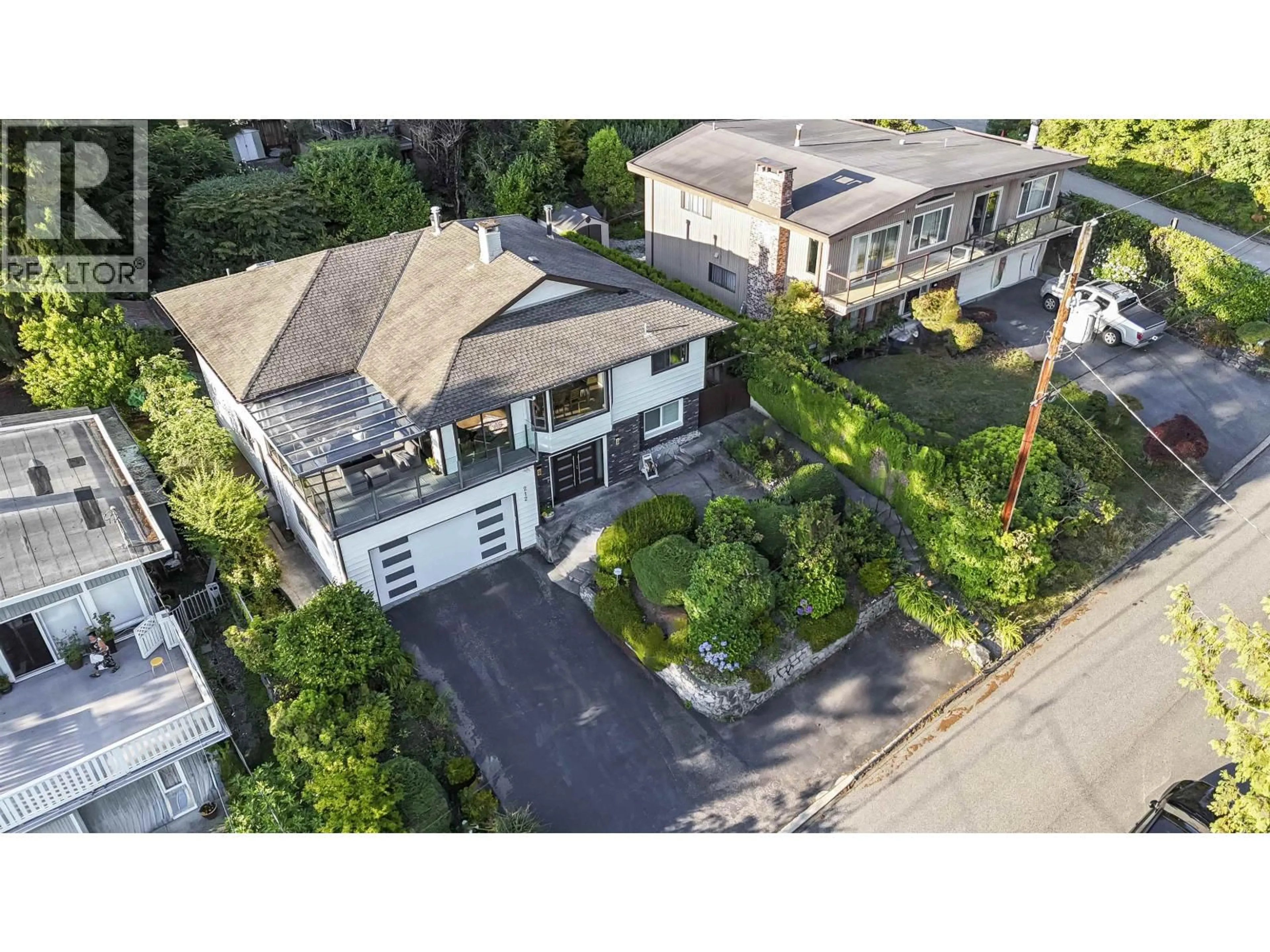 A pic from outside/outdoor area/front of a property/back of a property/a pic from drone, street for 212 BALMORAL ROAD, North Vancouver British Columbia V7N2T8