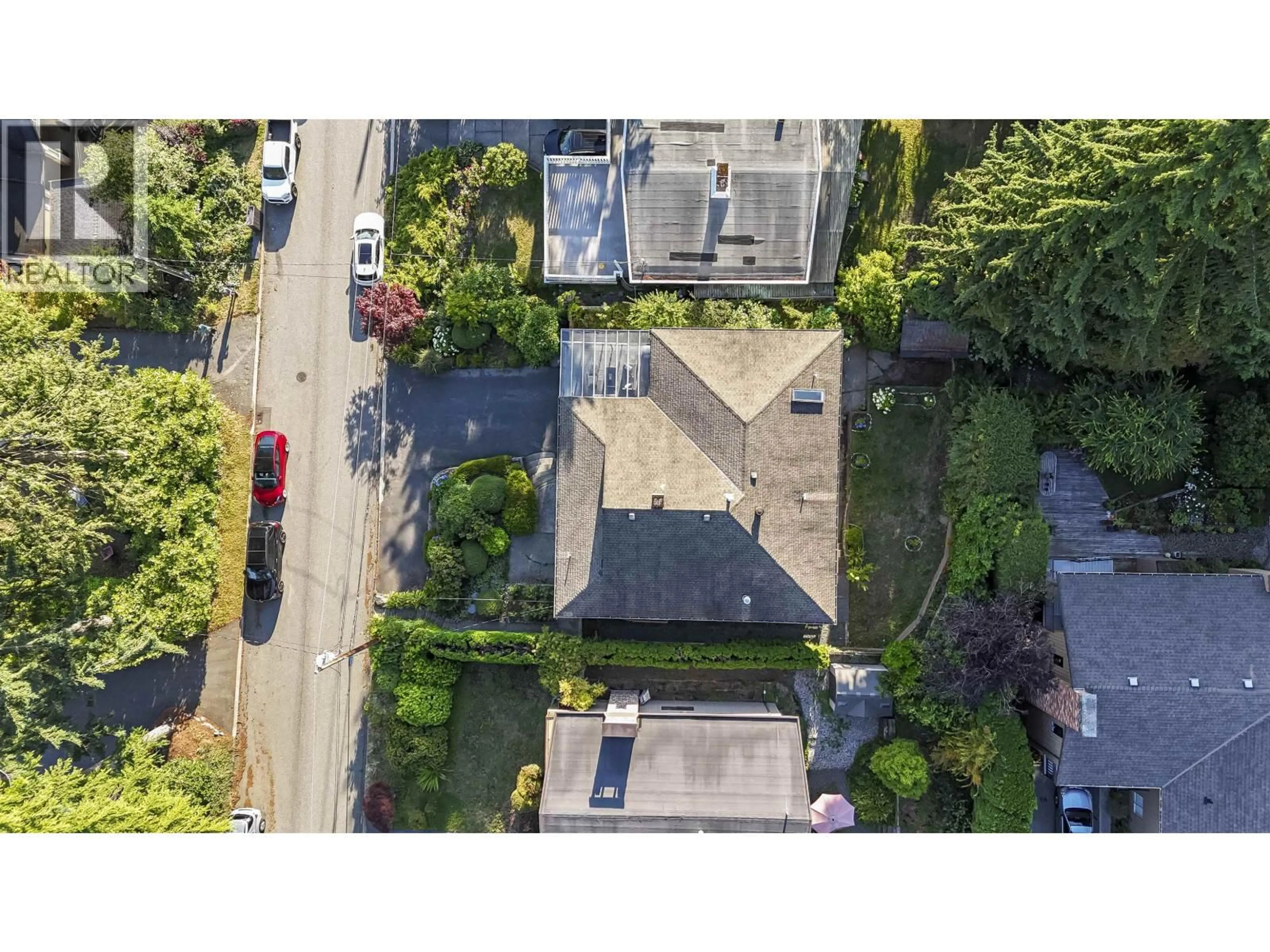 A pic from outside/outdoor area/front of a property/back of a property/a pic from drone, street for 212 BALMORAL ROAD, North Vancouver British Columbia V7N2T8