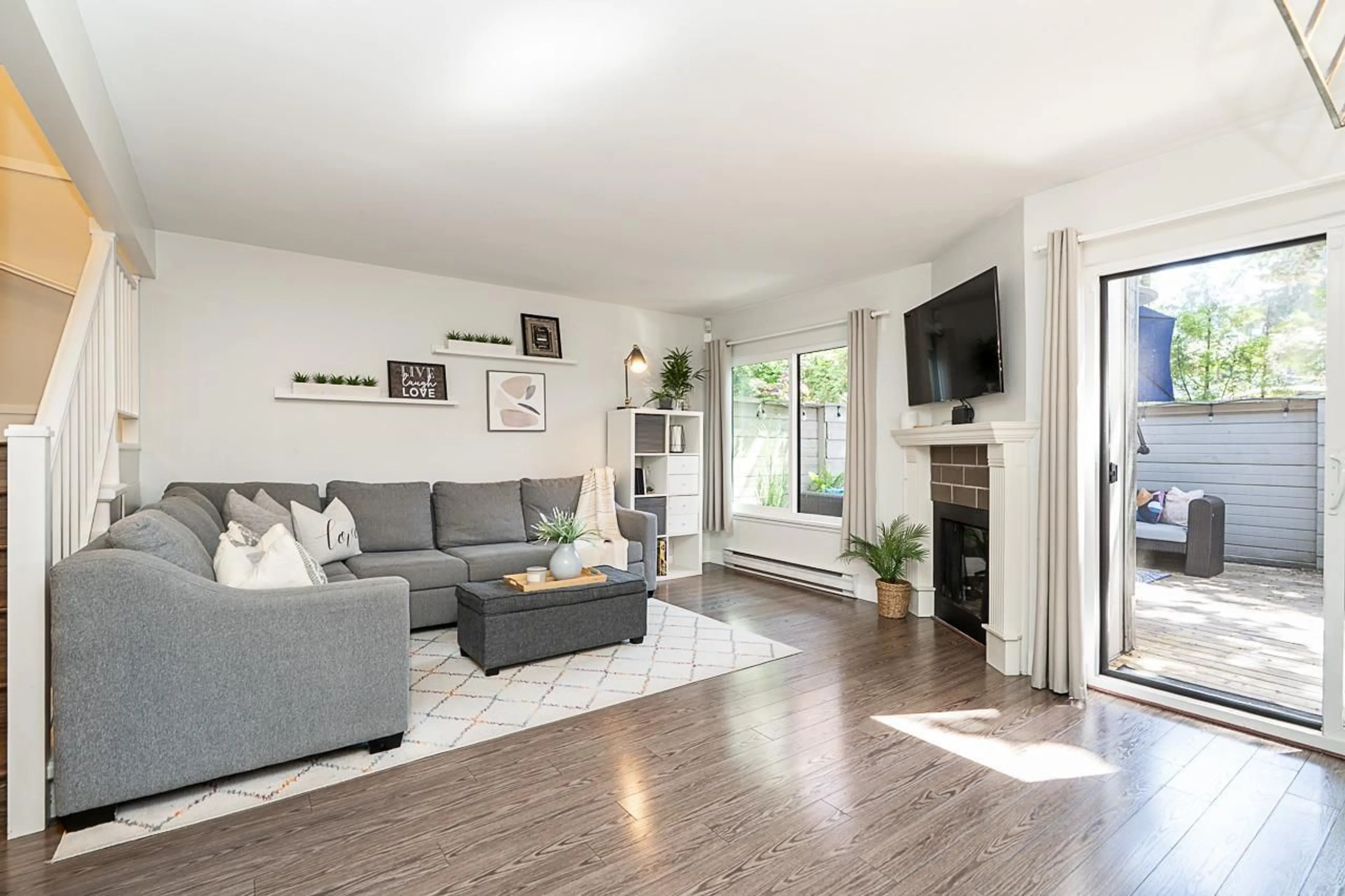Living room with furniture, wood/laminate floor for 48 - 6712 BAKER ROAD, Delta British Columbia V4E2V3