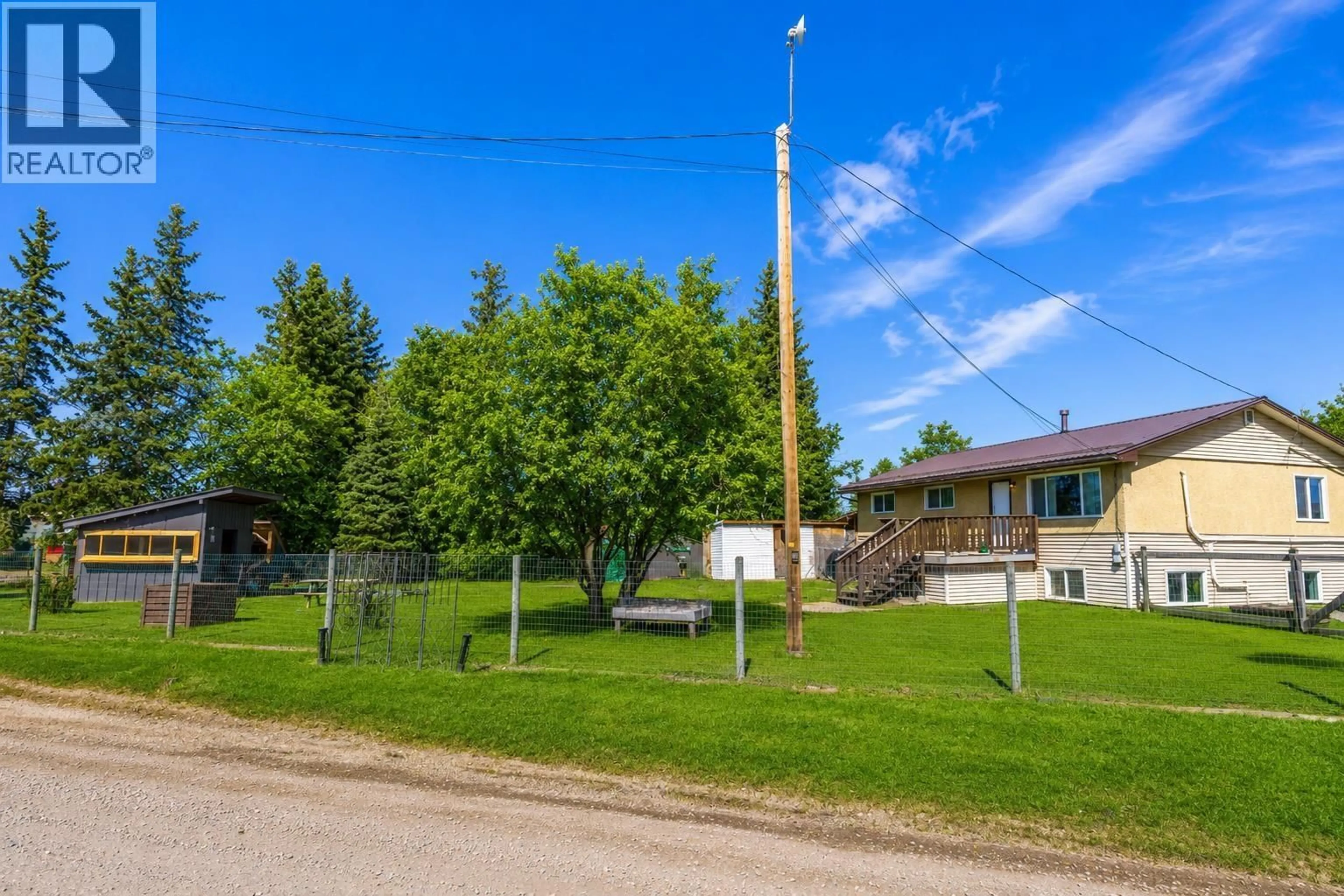 A pic from outside/outdoor area/front of a property/back of a property/a pic from drone, street for 11222 POPLAR ROAD, Fort St. John British Columbia V1J8E5
