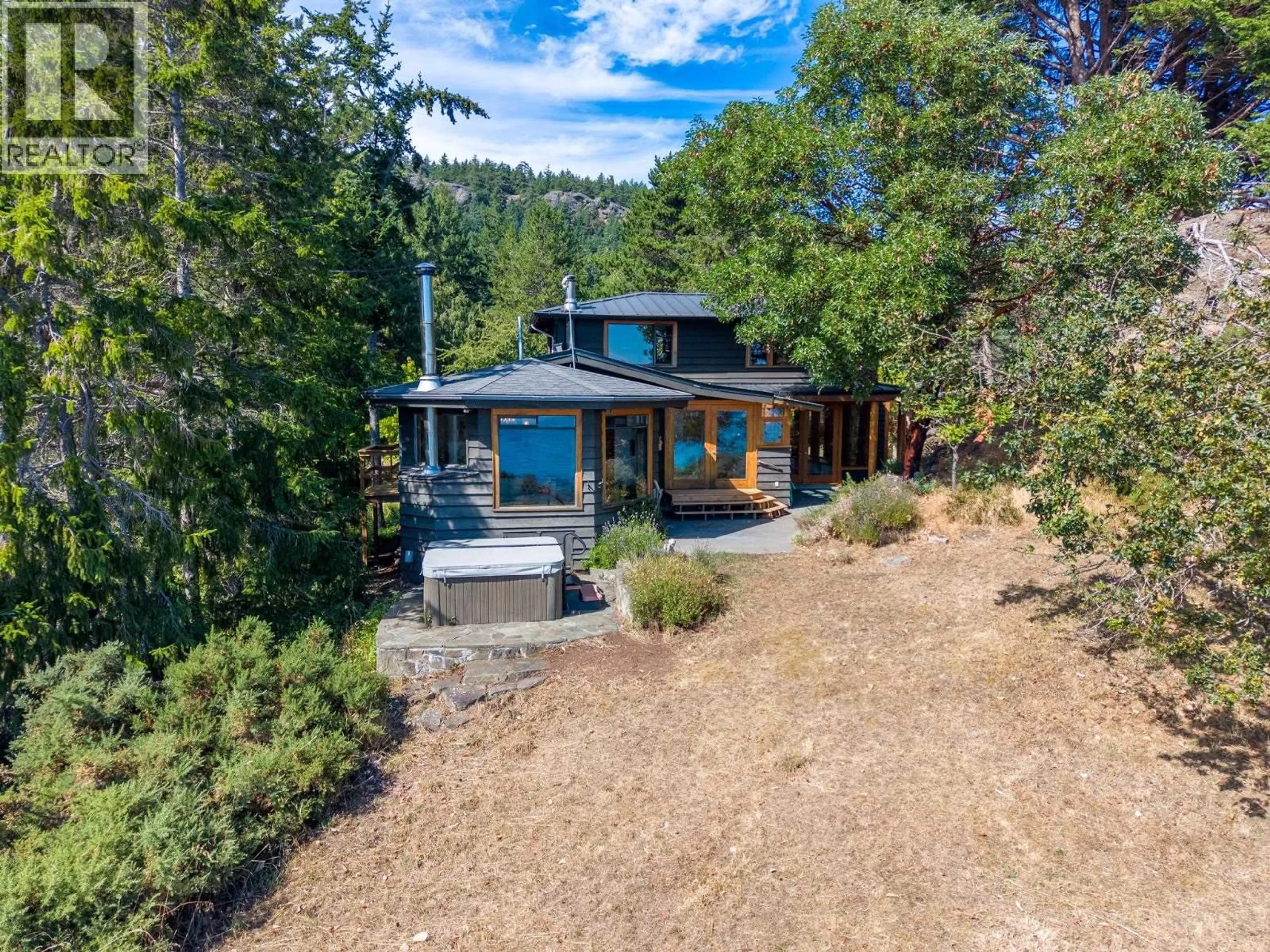 A pic from outside/outdoor area/front of a property/back of a property/a pic from drone, water/lake/river/ocean view for 9919 SOUTHLANDS DRIVE, Pender Island British Columbia V0N2M3