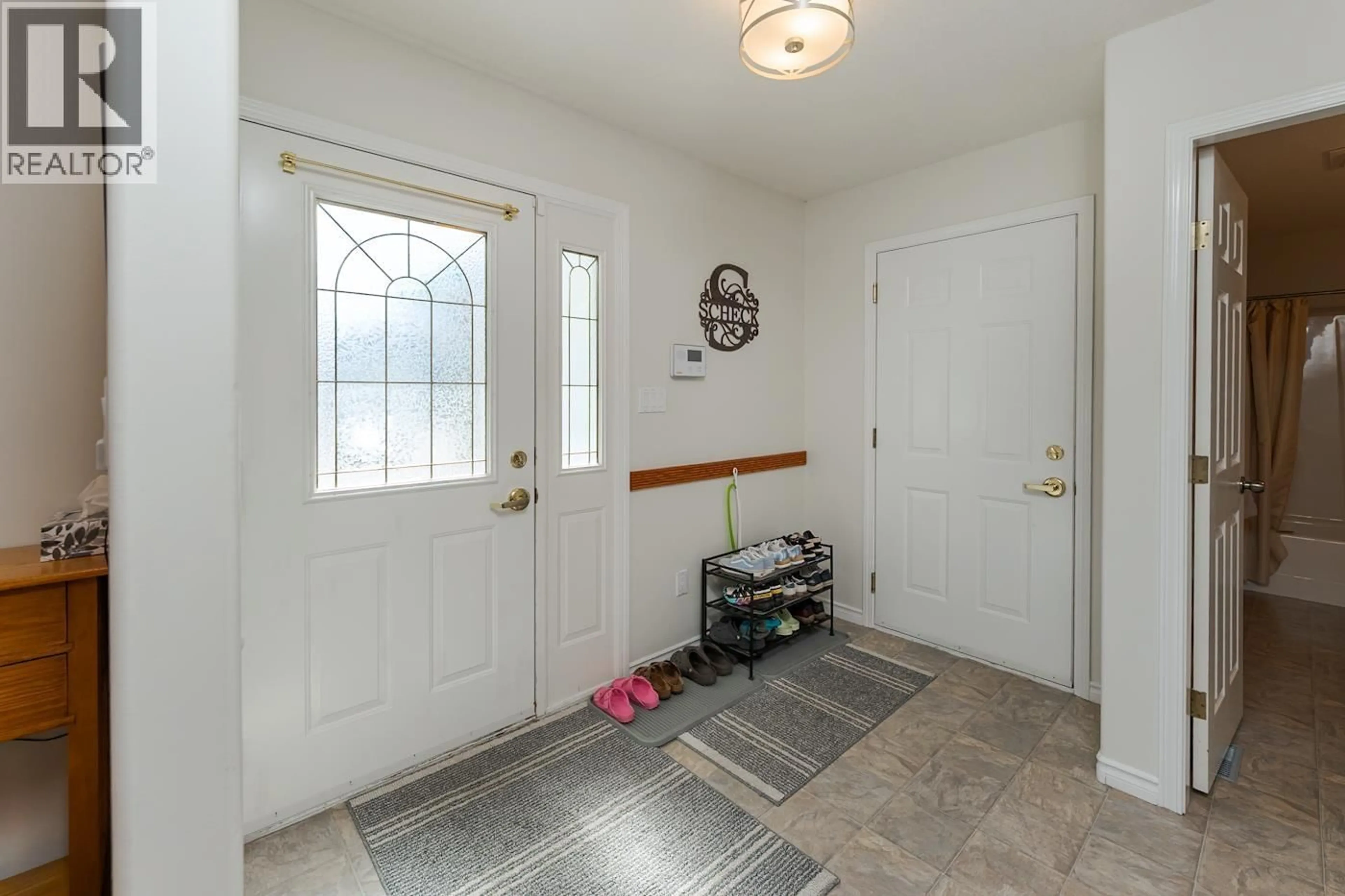 Indoor entryway for 121 - 7180 ST LAWRENCE AVENUE, Prince George British Columbia V2N5C6