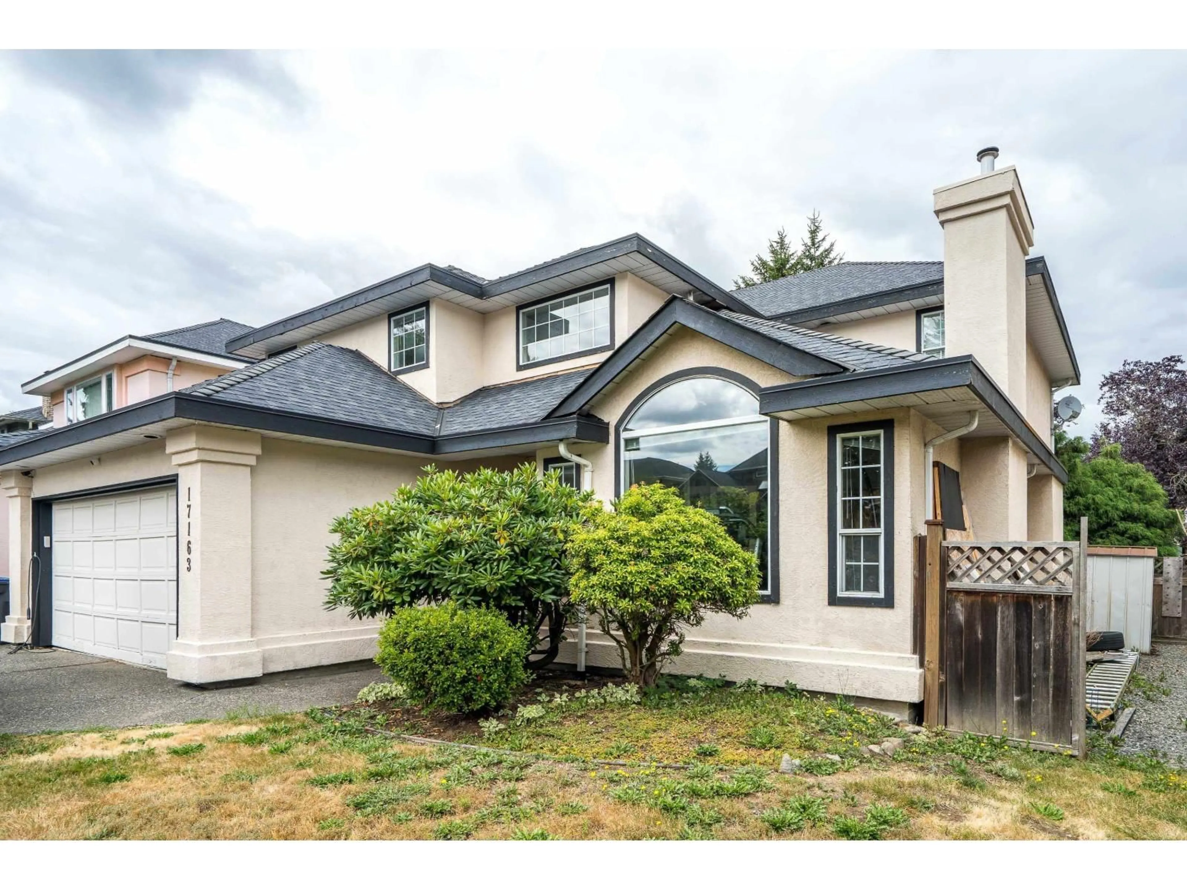 Home with vinyl exterior material, street for 17163 102 AVENUE, Surrey British Columbia V4N3L4