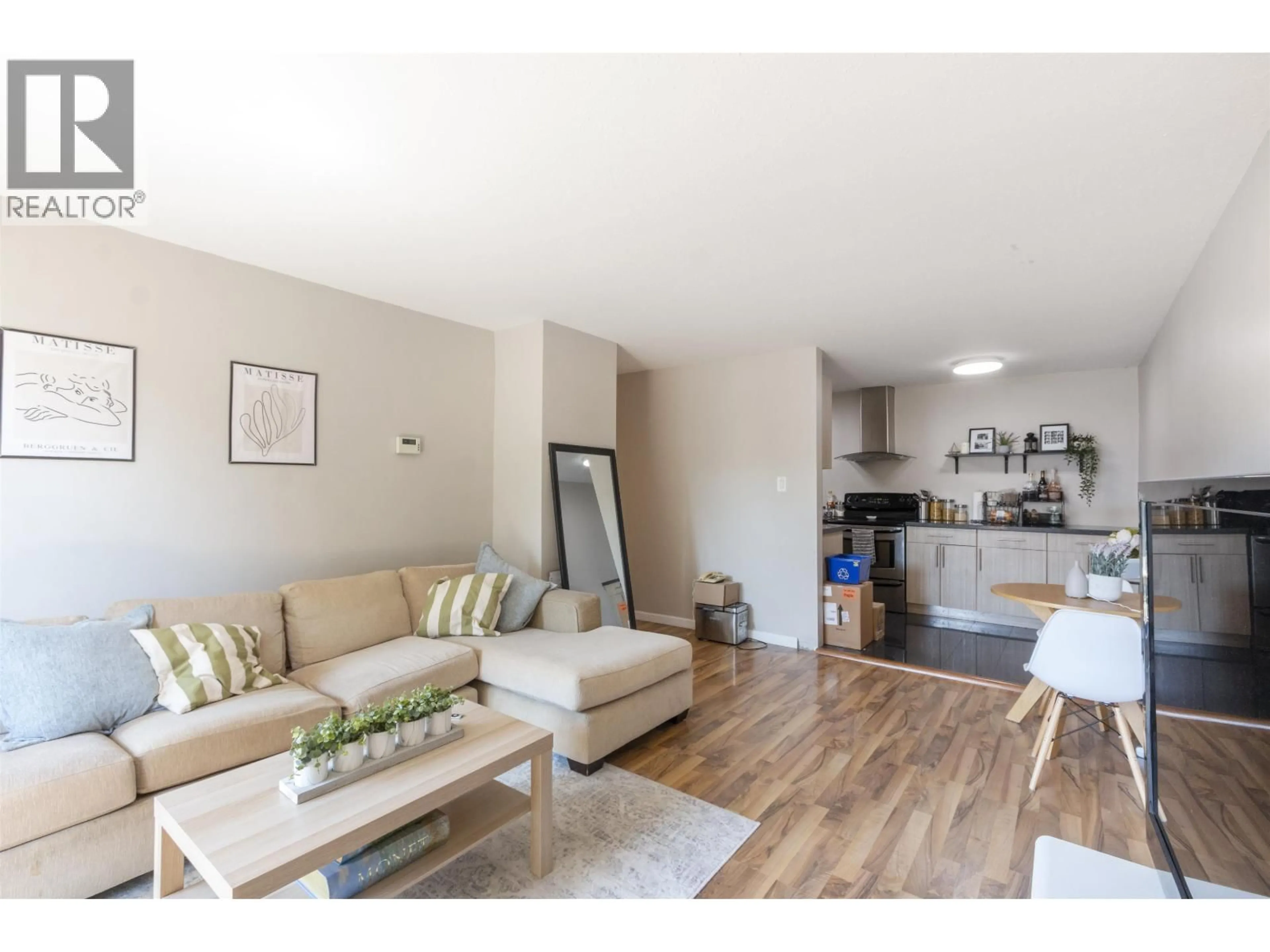 Living room with furniture, wood/laminate floor for 107 - 1000 KING ALBERT AVENUE, Coquitlam British Columbia V3J7A3