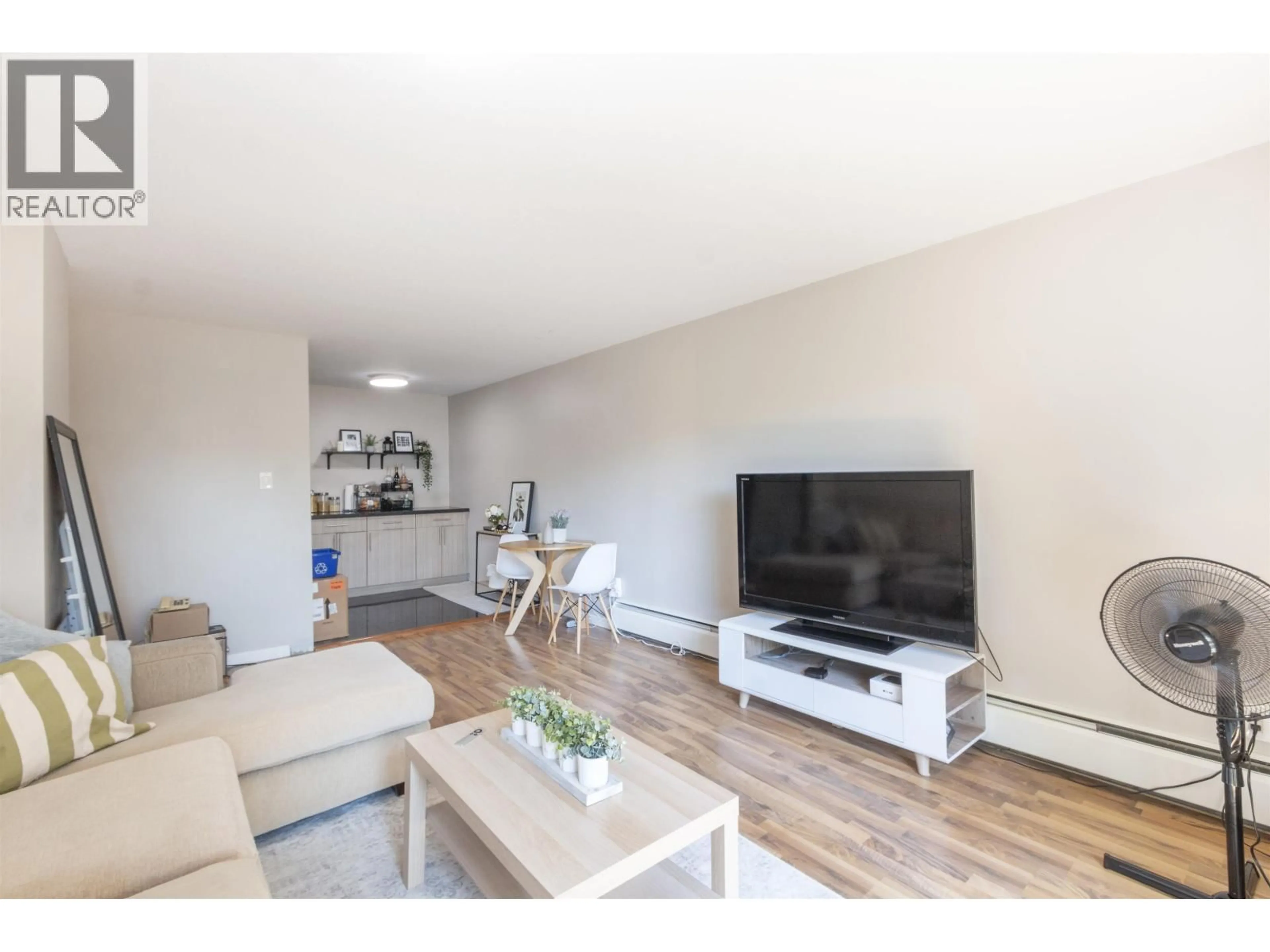 Living room with furniture, wood/laminate floor for 107 - 1000 KING ALBERT AVENUE, Coquitlam British Columbia V3J7A3