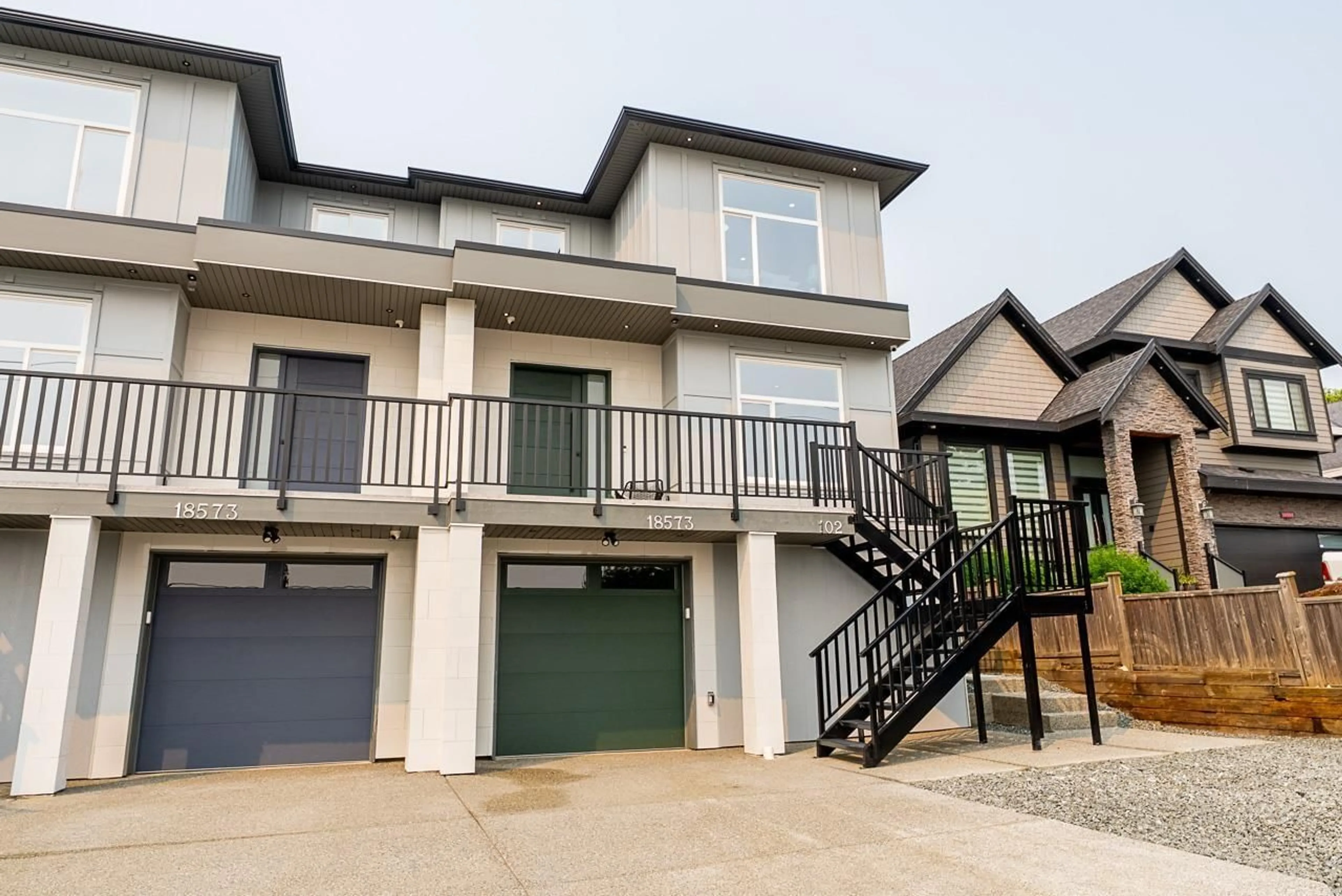 Home with vinyl exterior material, street for 102 - 18573 56 AVENUE, Surrey British Columbia V3S8J3