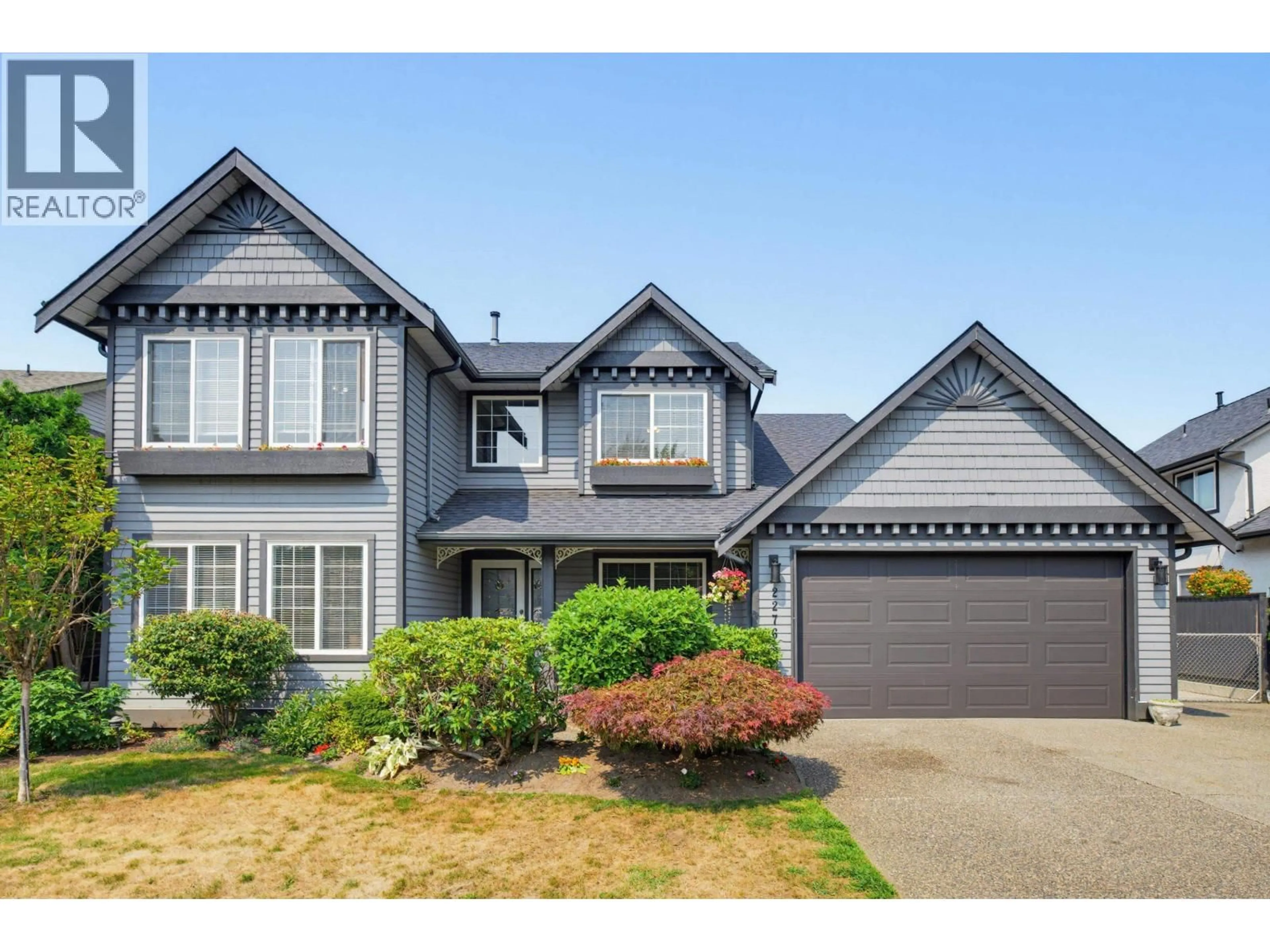 Home with vinyl exterior material, street for 22765 126B AVENUE, Maple Ridge British Columbia V2X2N7