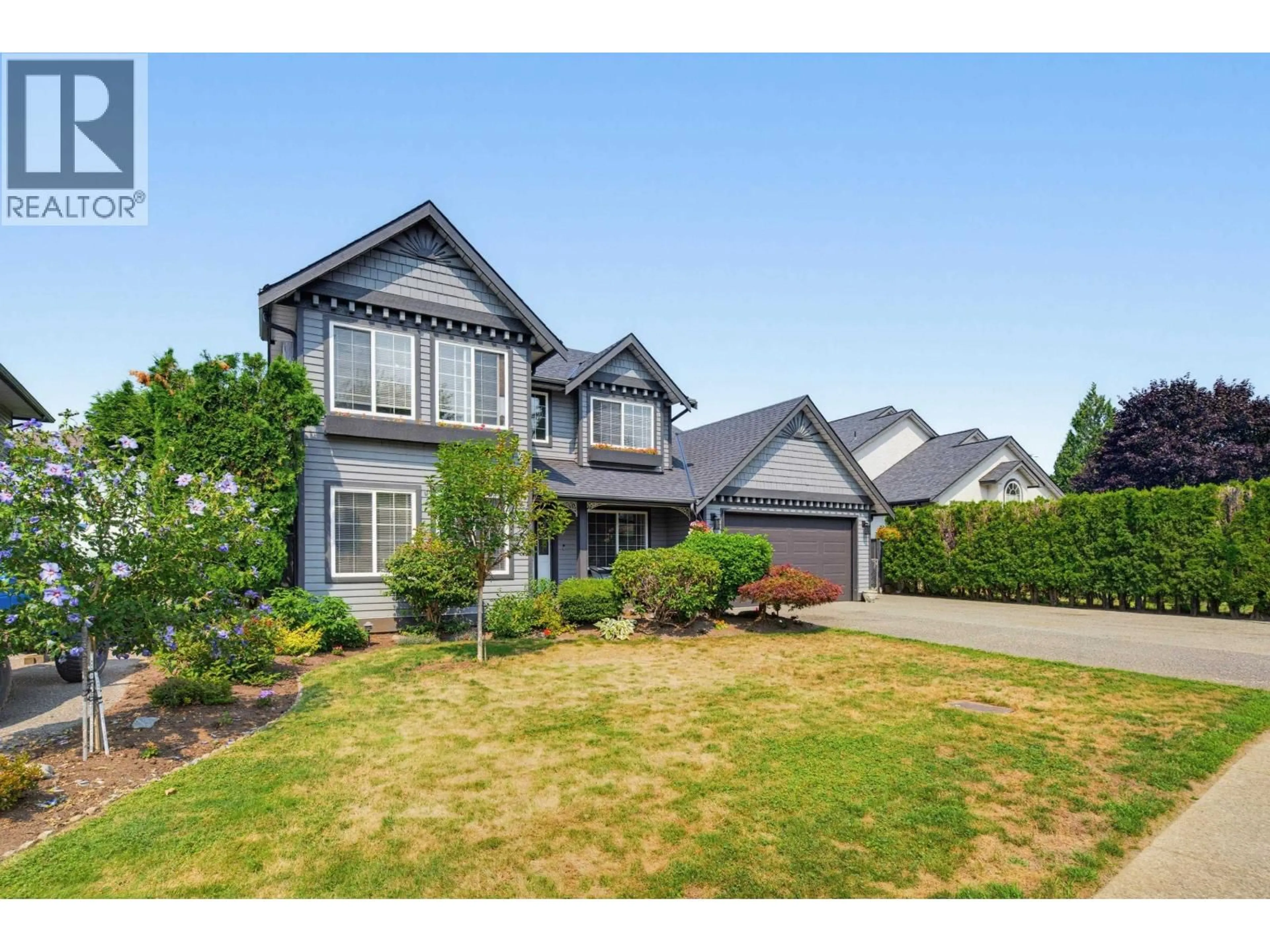 Home with vinyl exterior material, street for 22765 126B AVENUE, Maple Ridge British Columbia V2X2N7