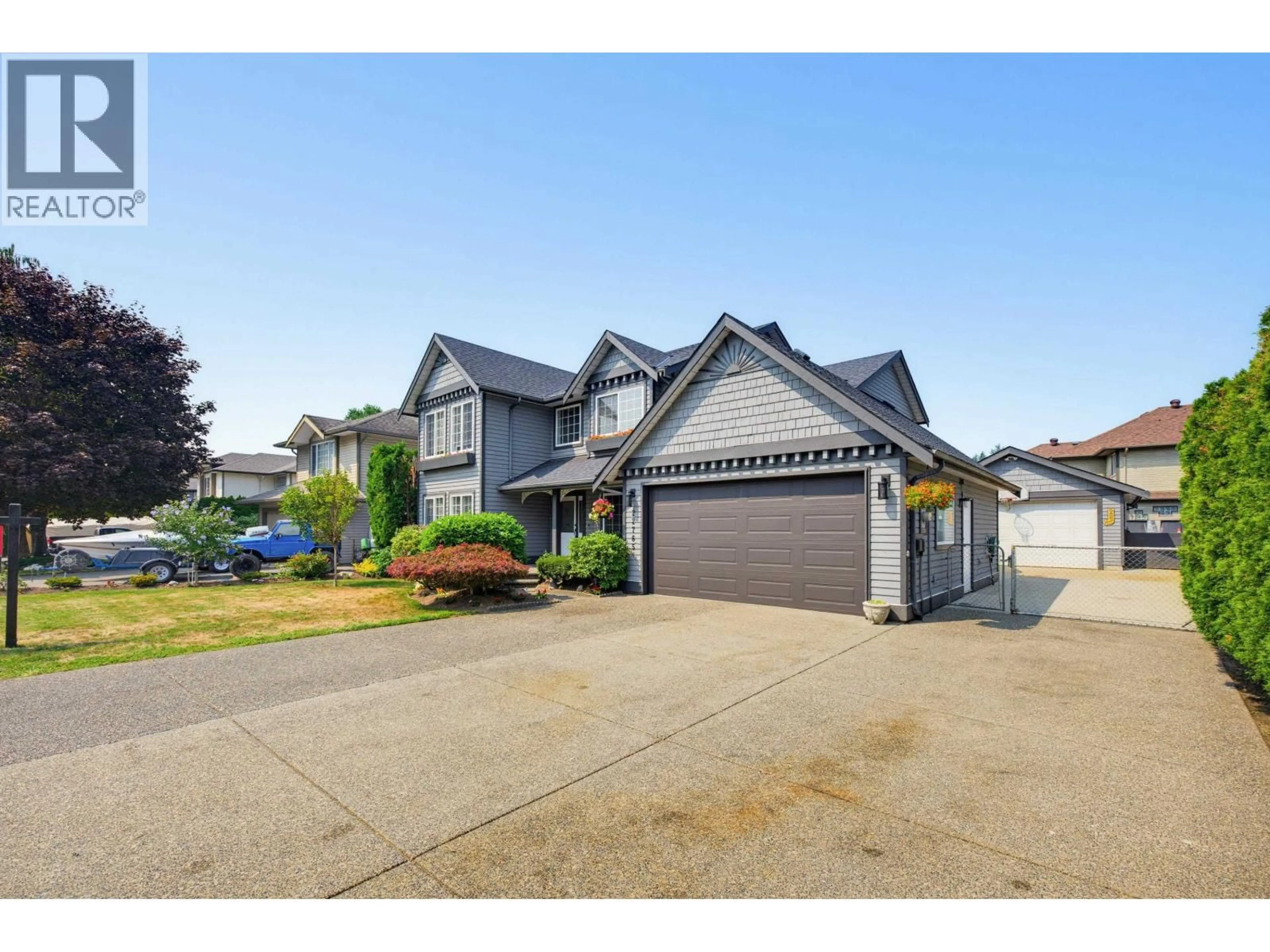 Home with vinyl exterior material, street for 22765 126B AVENUE, Maple Ridge British Columbia V2X2N7