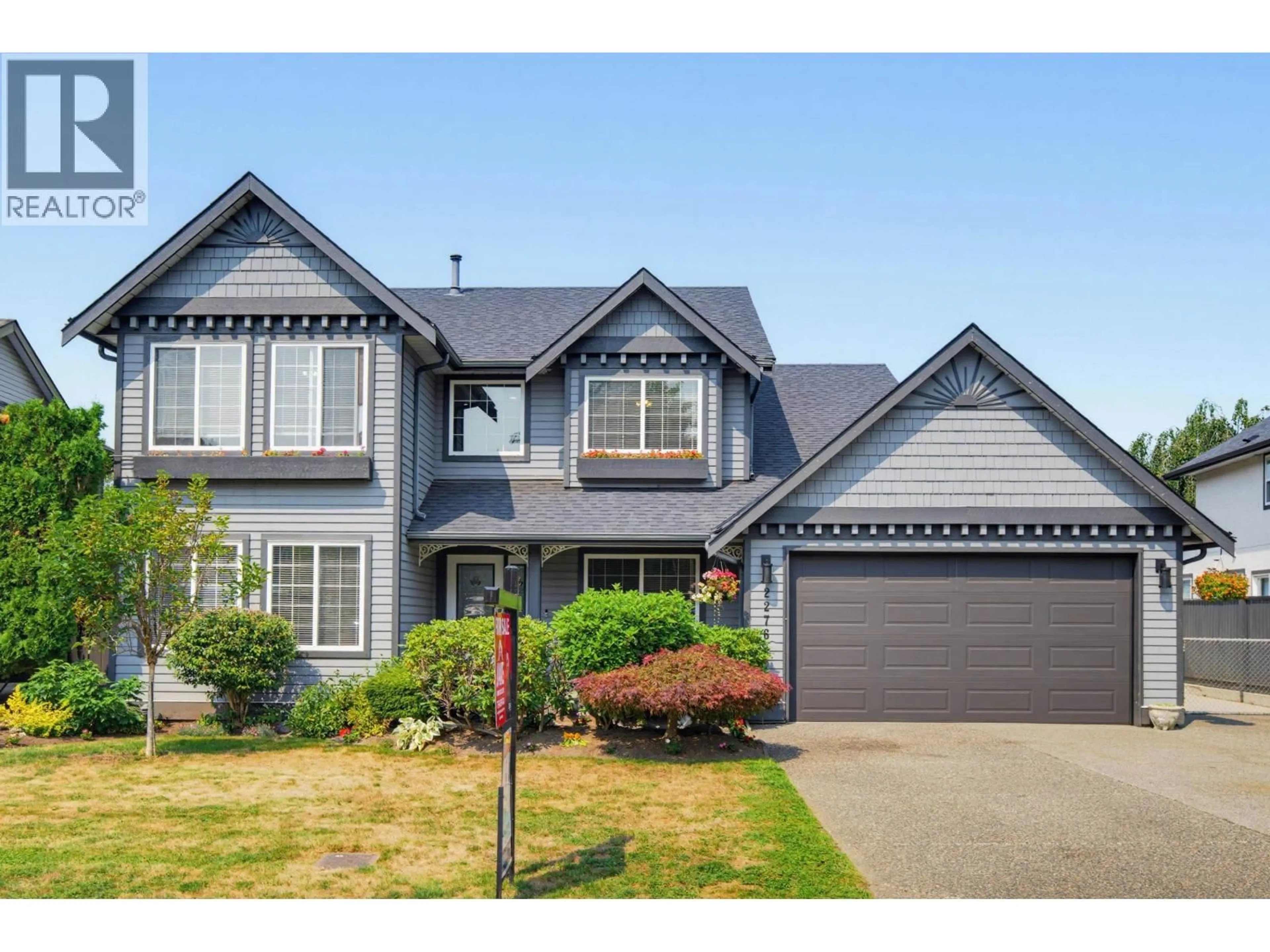 Home with vinyl exterior material, street for 22765 126B AVENUE, Maple Ridge British Columbia V2X2N7