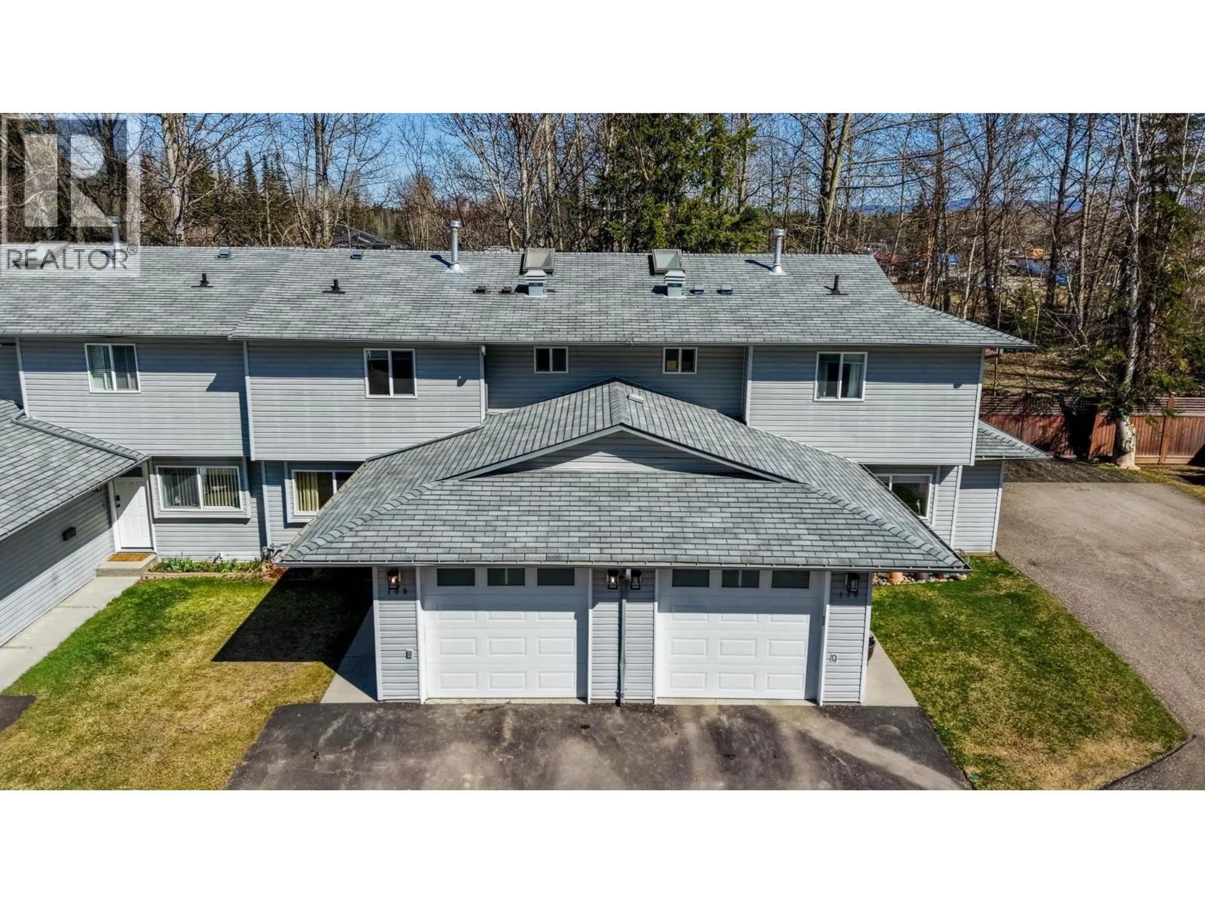 A pic from outside/outdoor area/front of a property/back of a property/a pic from drone, unknown for 109 - 3885 RICHET STREET, Prince George British Columbia V2K2J2