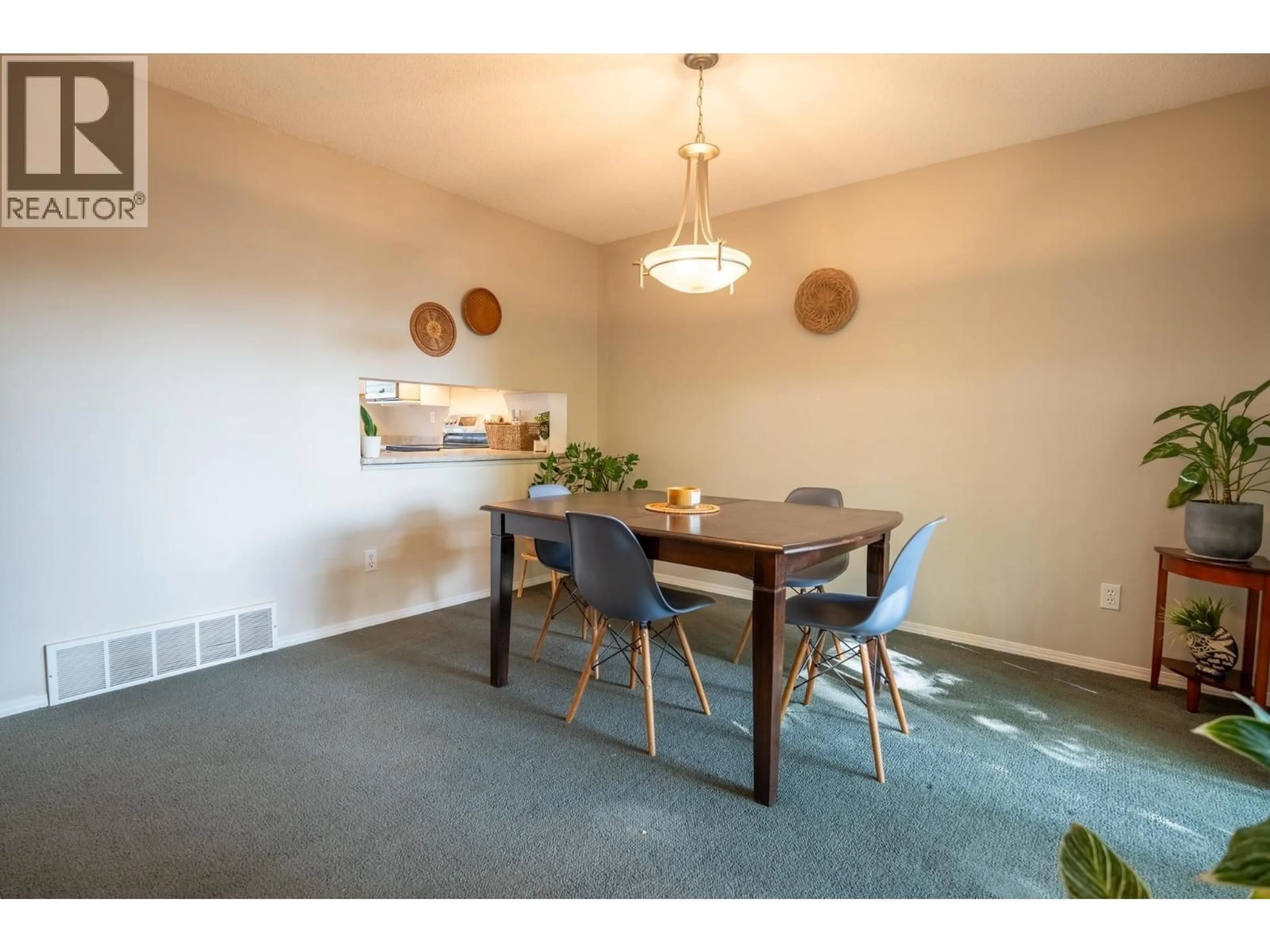 Dining room, wood/laminate floor for 109 - 3885 RICHET STREET, Prince George British Columbia V2K2J2