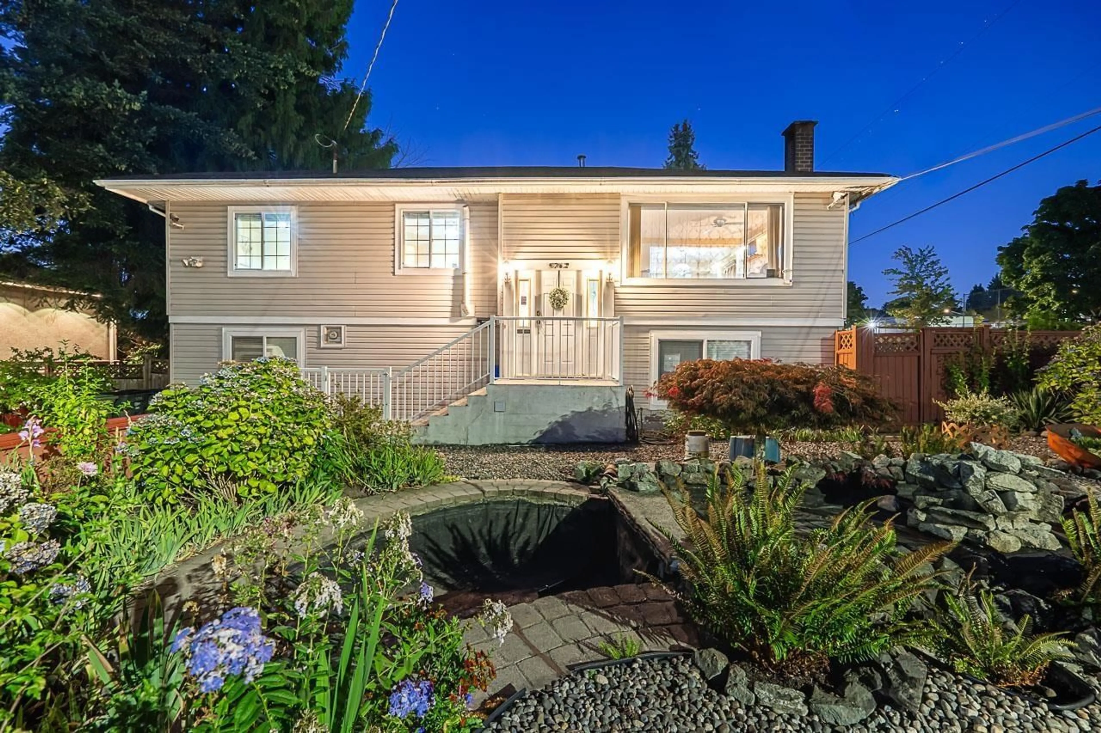 Home with vinyl exterior material, street for 9762 116 STREET, Surrey British Columbia V3V3Z9
