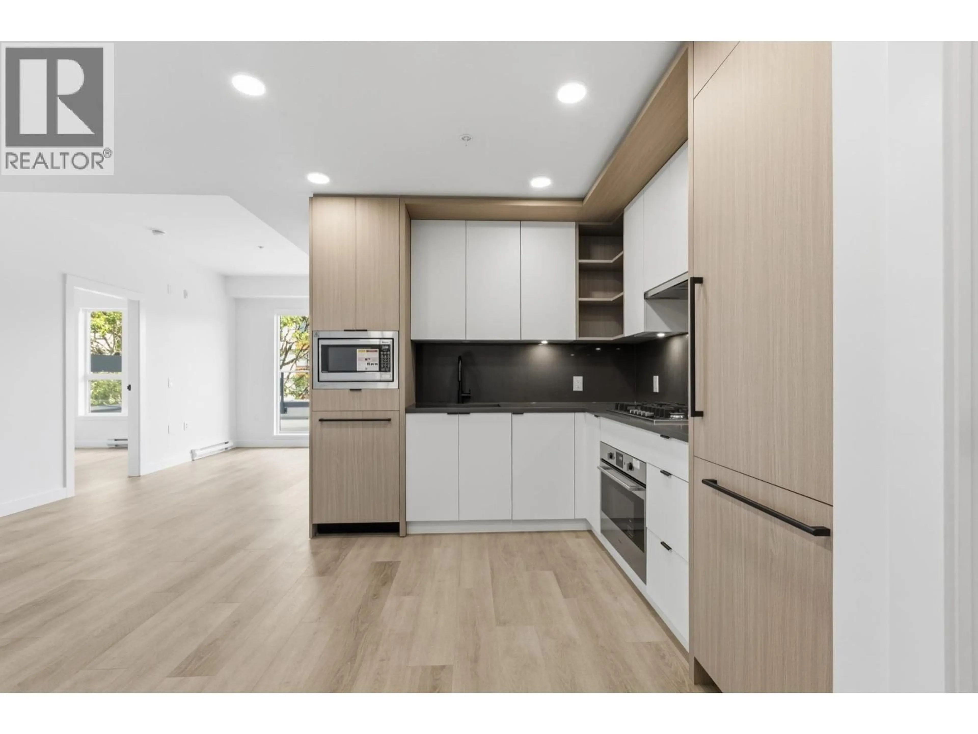 Open concept kitchen, unknown for 403 - 2268 BROADWAY, Vancouver British Columbia V5N0L2