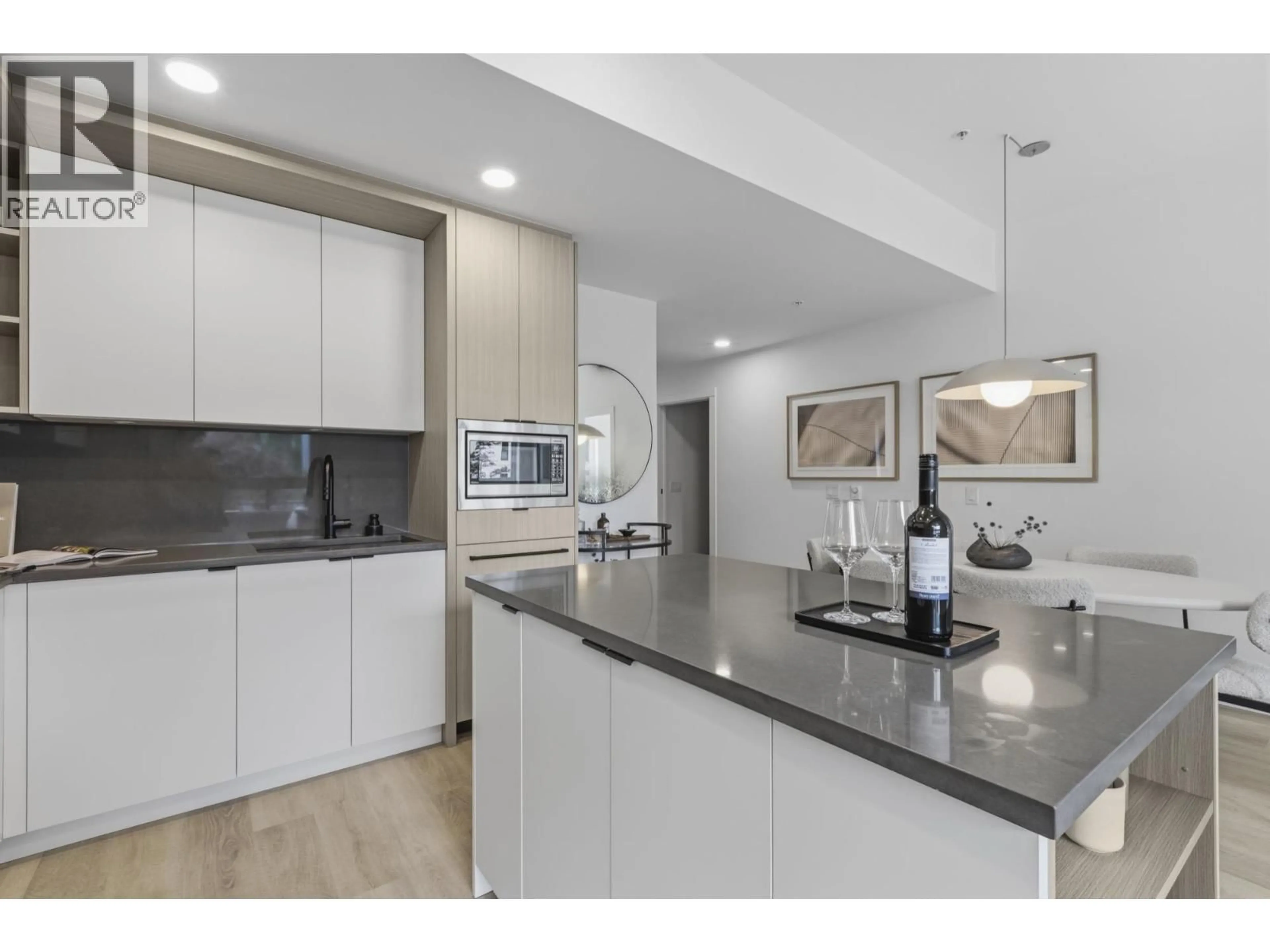 Open concept kitchen, unknown for 107 - 2268 BROADWAY, Vancouver British Columbia V5N0L2