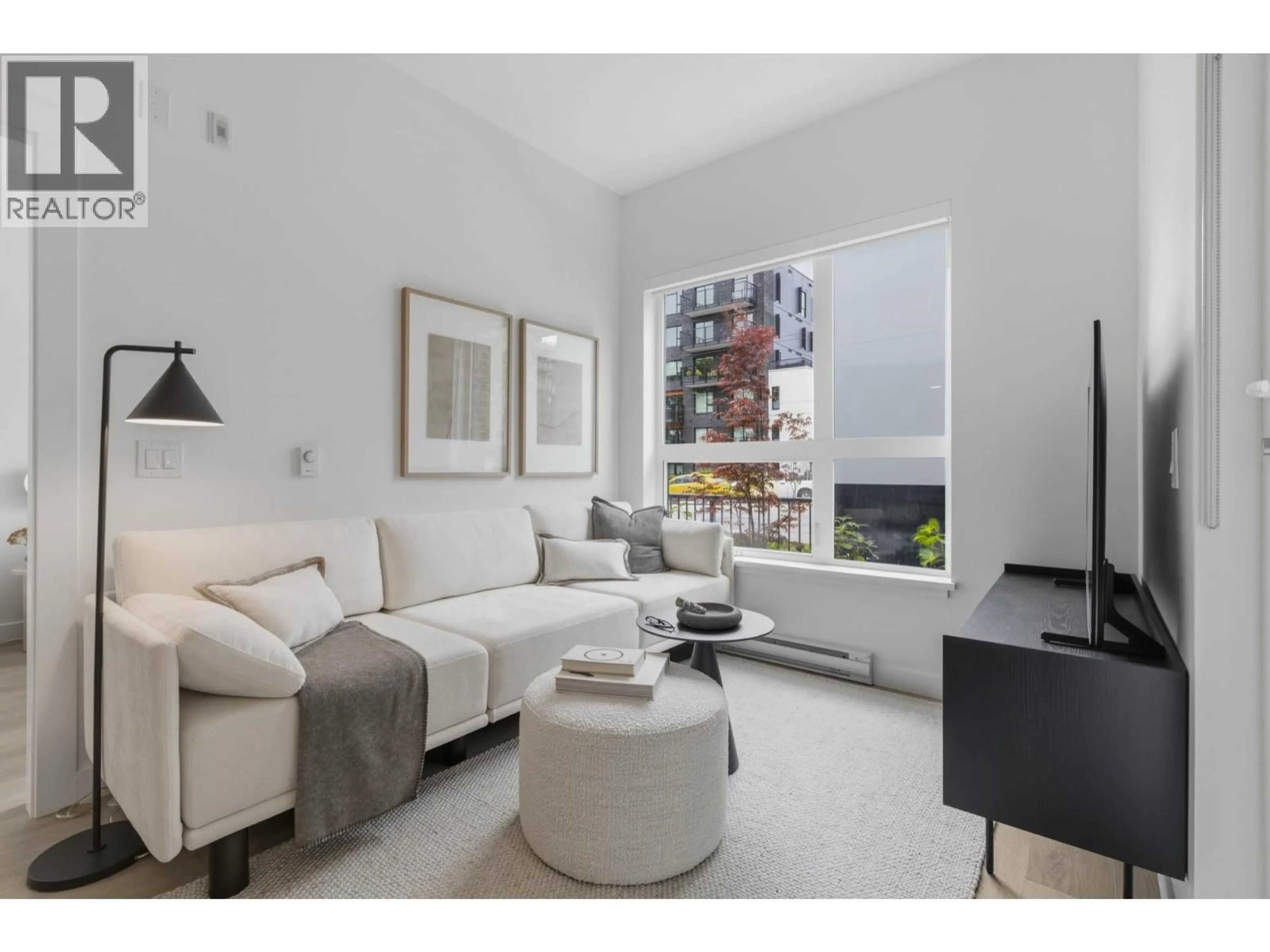 Living room with furniture, unknown for 107 - 2268 BROADWAY, Vancouver British Columbia V5N0L2