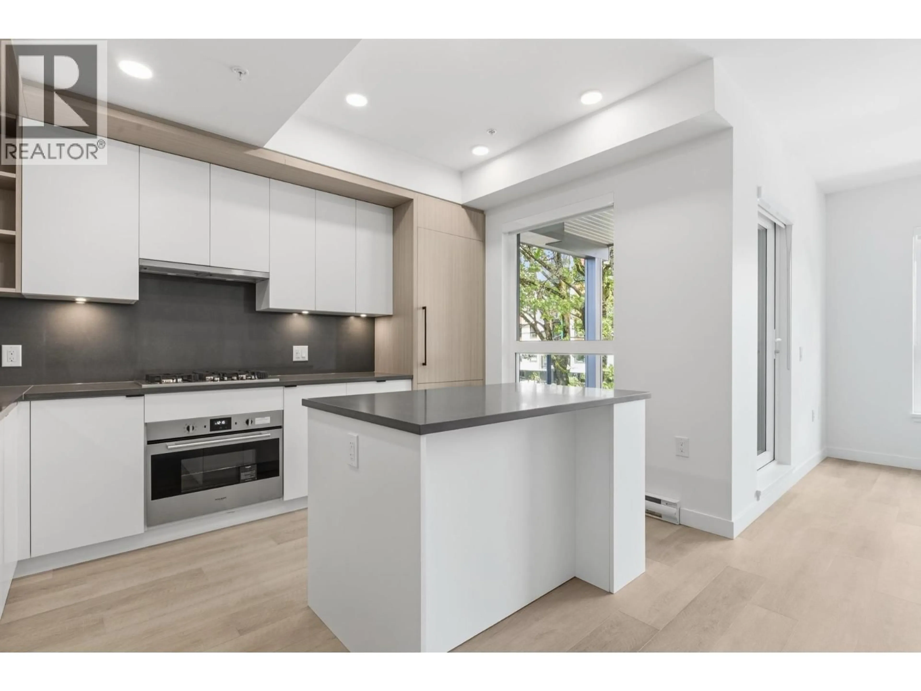 Open concept kitchen, unknown for 203 - 2268 BROADWAY, Vancouver British Columbia V5N0L2