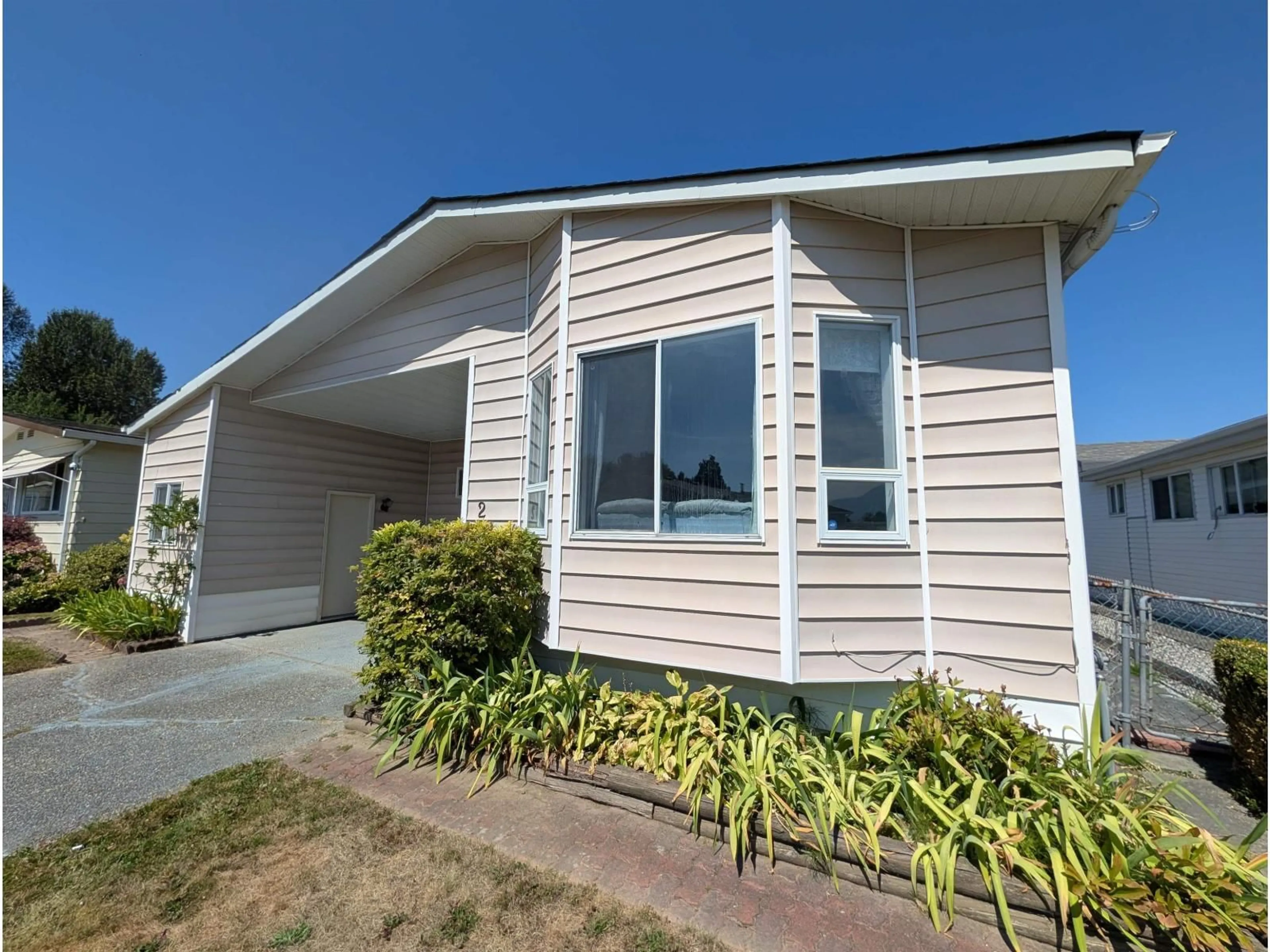Home with vinyl exterior material, street for 2 - 9055 ASHWELL ROAD, Chilliwack British Columbia V2P8A8