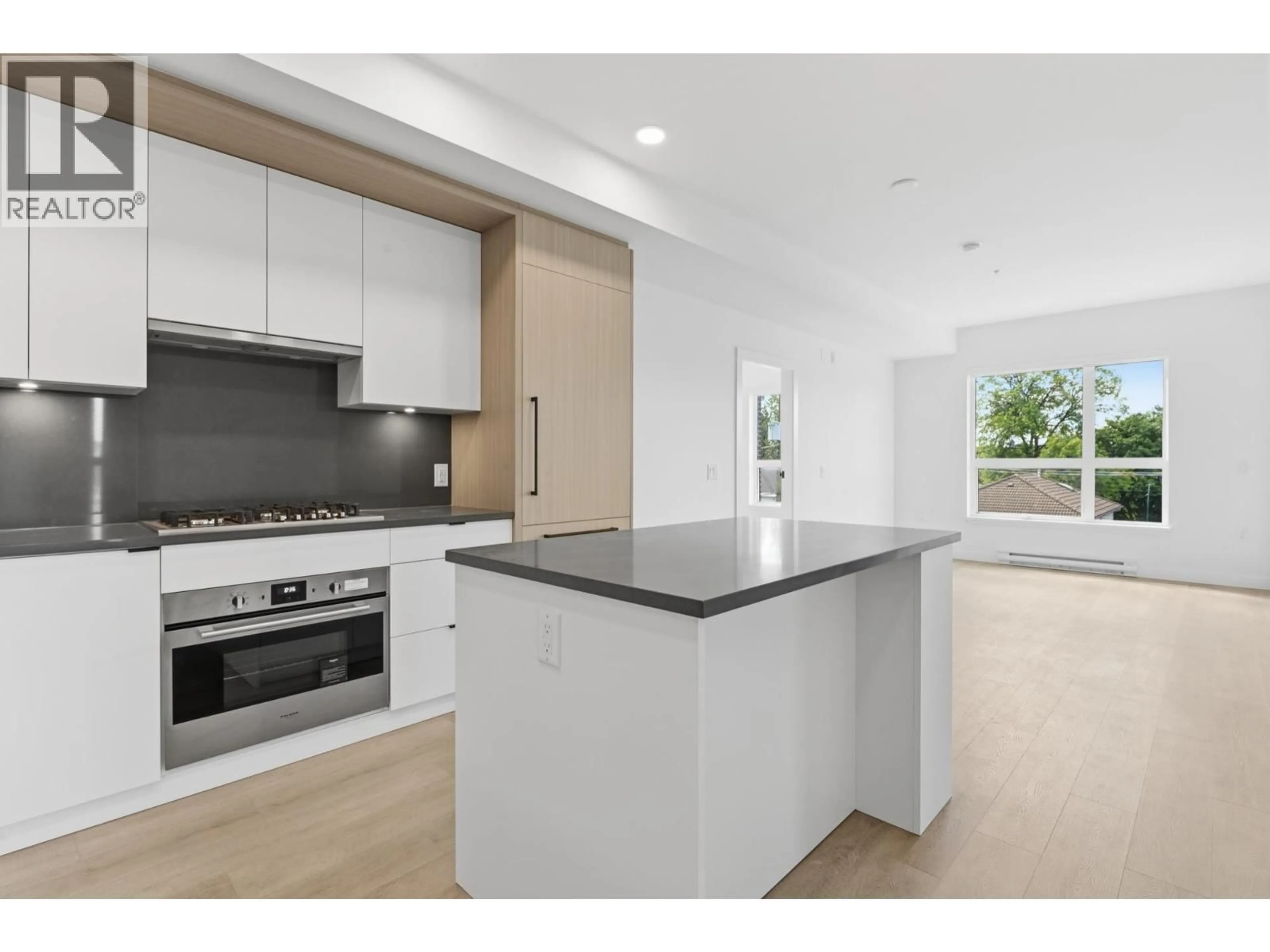 Open concept kitchen, unknown for 302 - 2268 BROADWAY, Vancouver British Columbia V5N0L2
