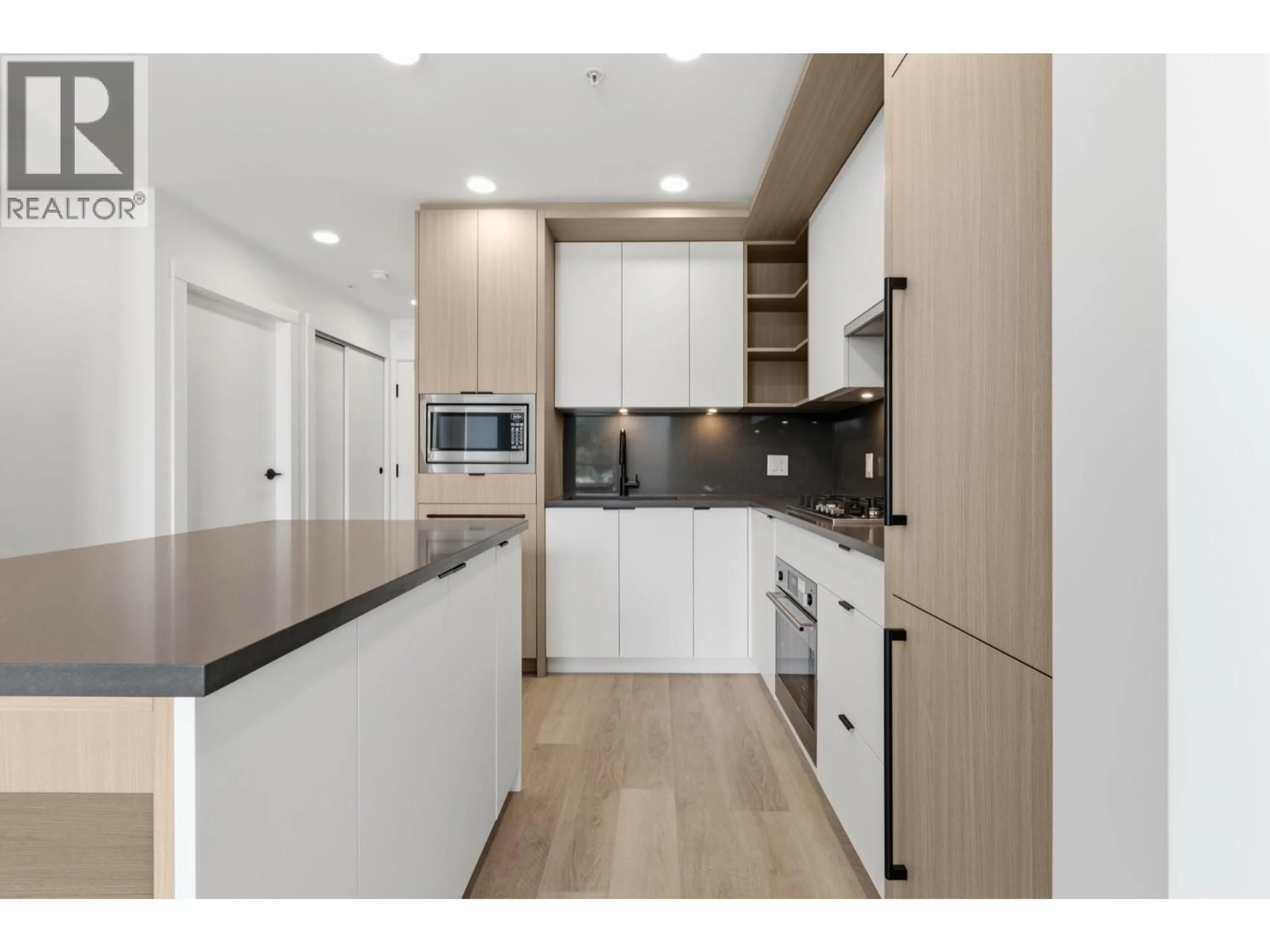Open concept kitchen, unknown for 504 - 2268 BROADWAY, Vancouver British Columbia V5N0L2