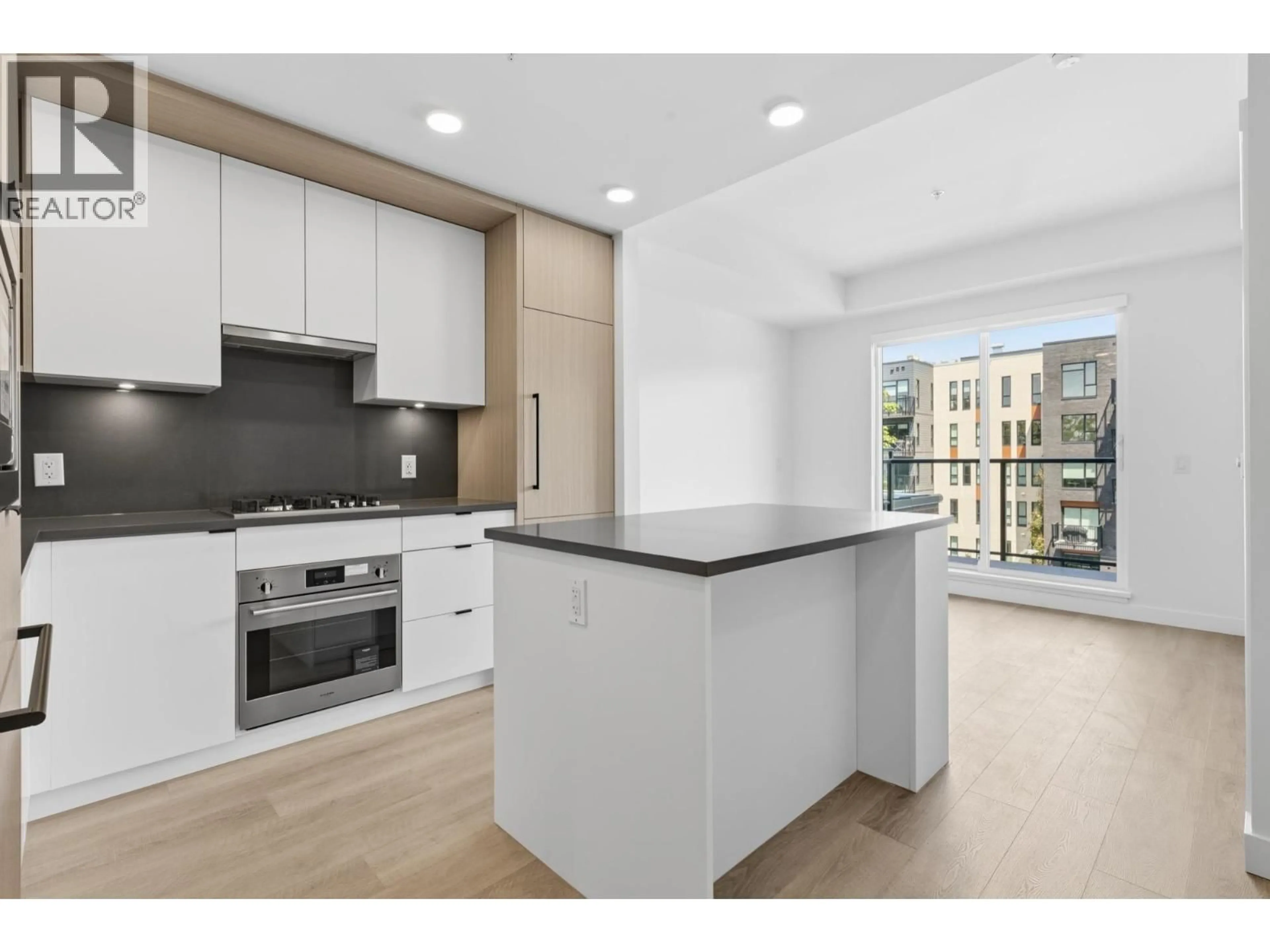Open concept kitchen, unknown for 404 - 2268 BROADWAY, Vancouver British Columbia V5N0L2