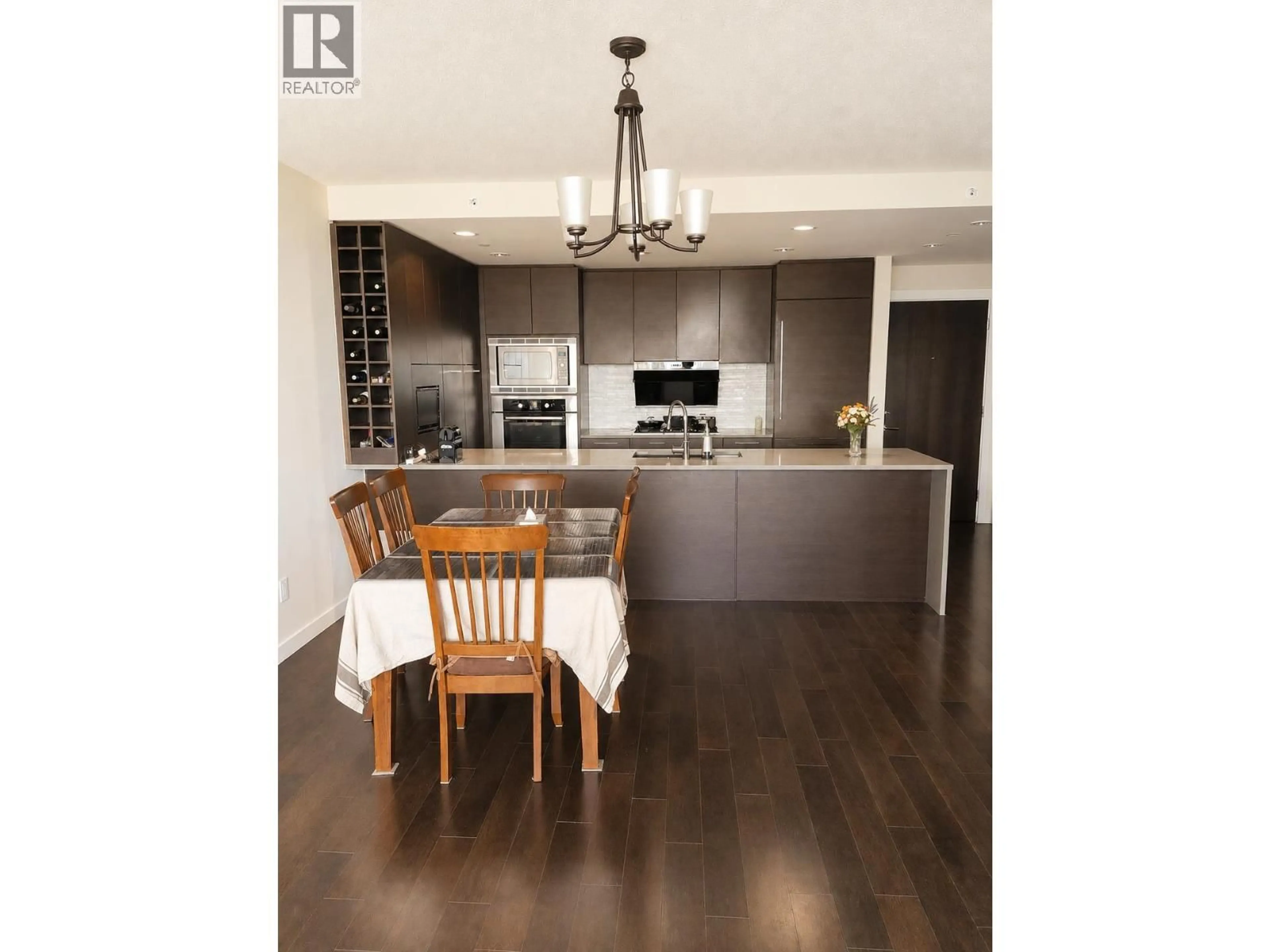 Open concept kitchen, wood/laminate floor for 1103 - 5868 AGRONOMY ROAD, Vancouver British Columbia V6T0B5