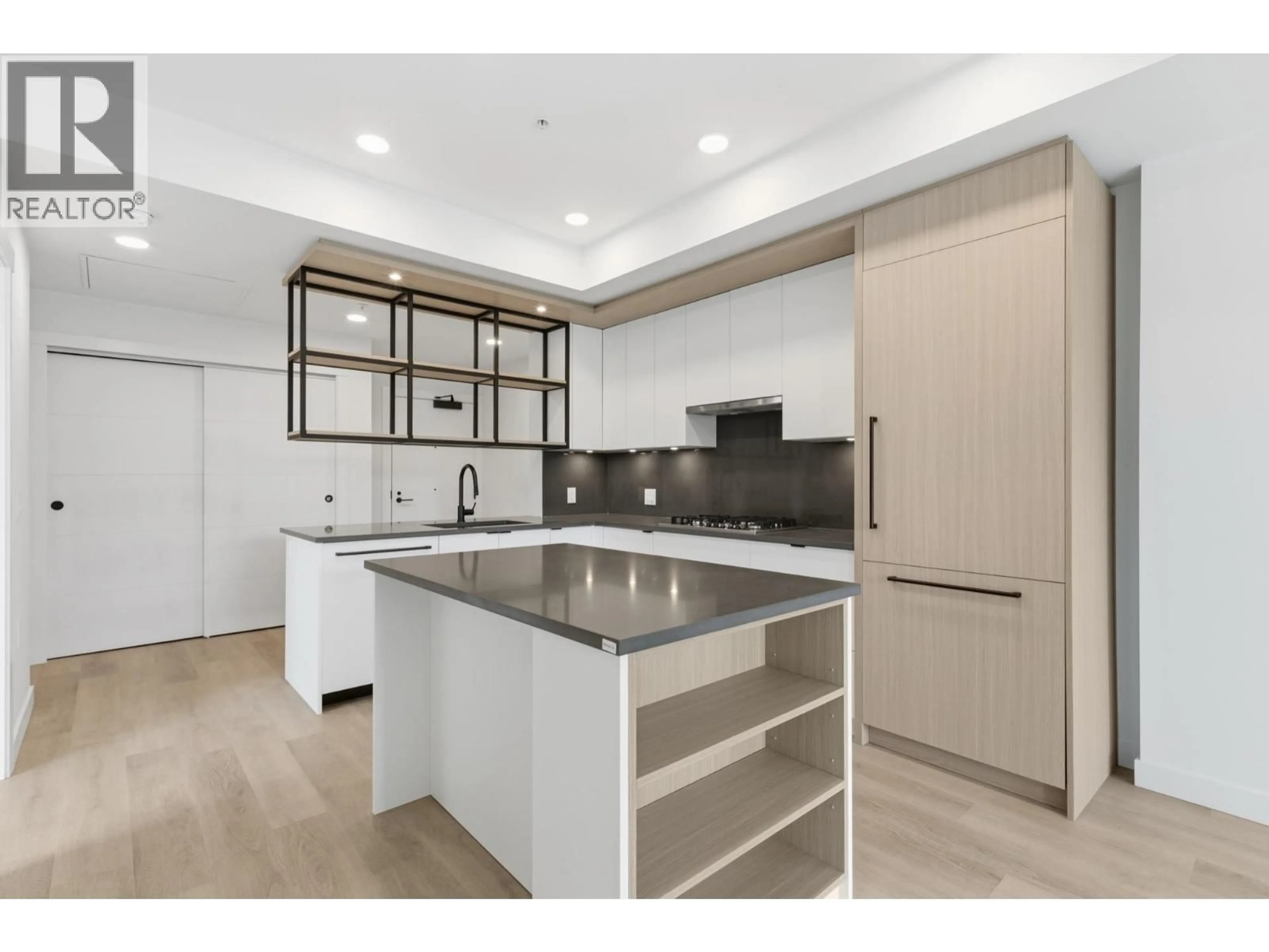 Open concept kitchen, unknown for 202 - 2268 BROADWAY, Vancouver British Columbia V5N0L2