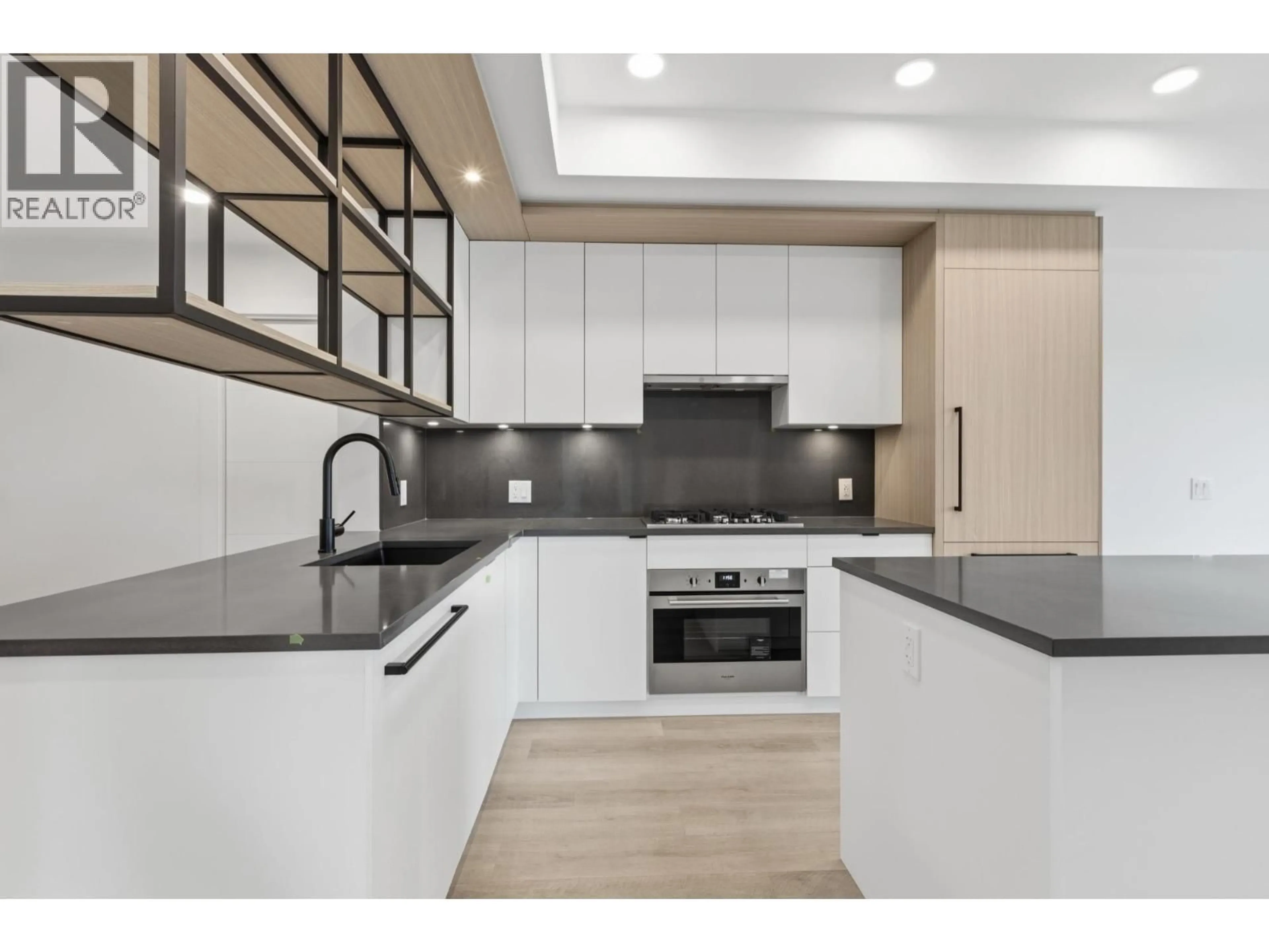 Open concept kitchen, unknown for 202 - 2268 BROADWAY, Vancouver British Columbia V5N0L2