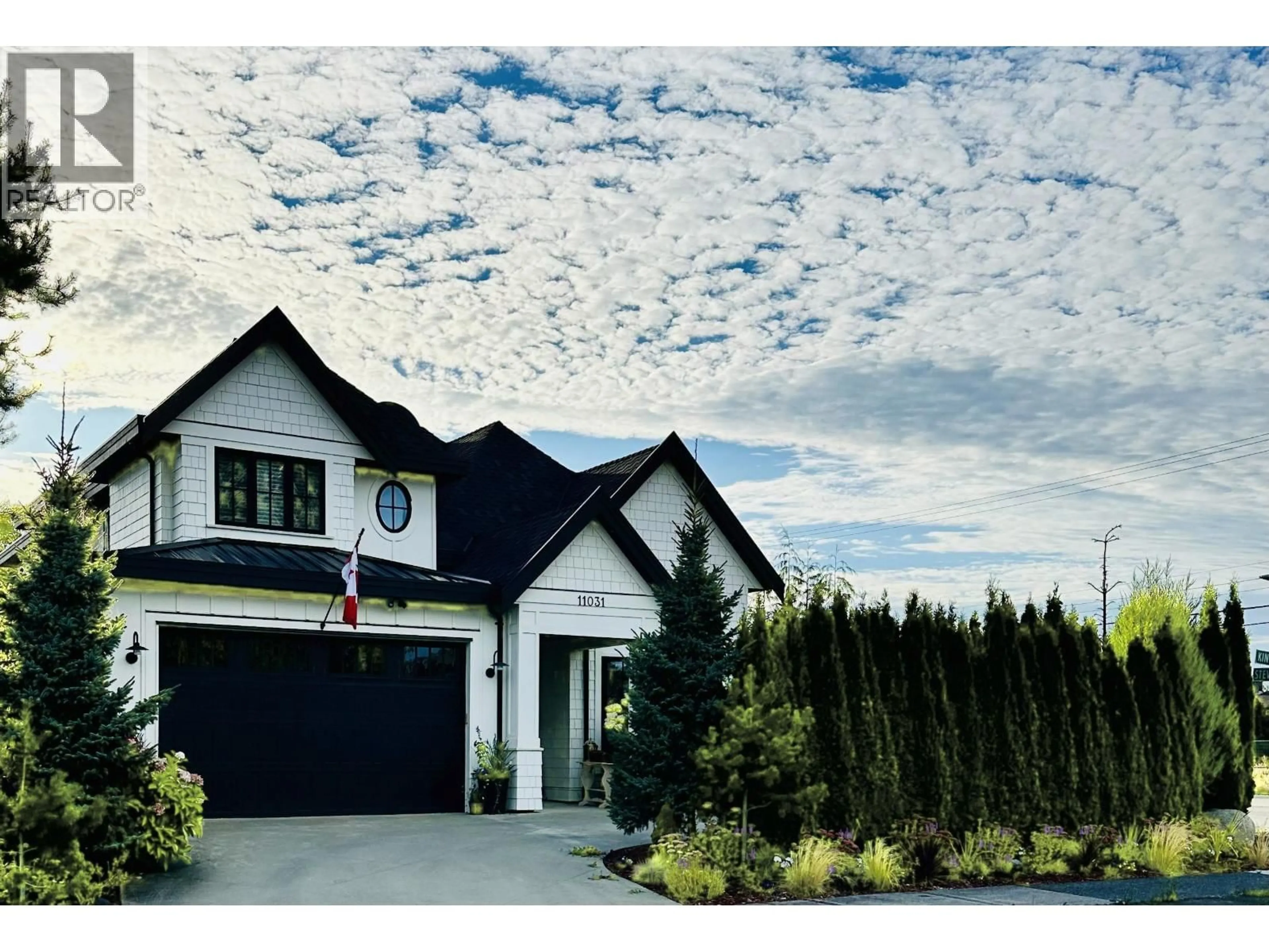 Home with vinyl exterior material, mountain view for 11031 KINGFISHER DRIVE, Richmond British Columbia V7E4P8