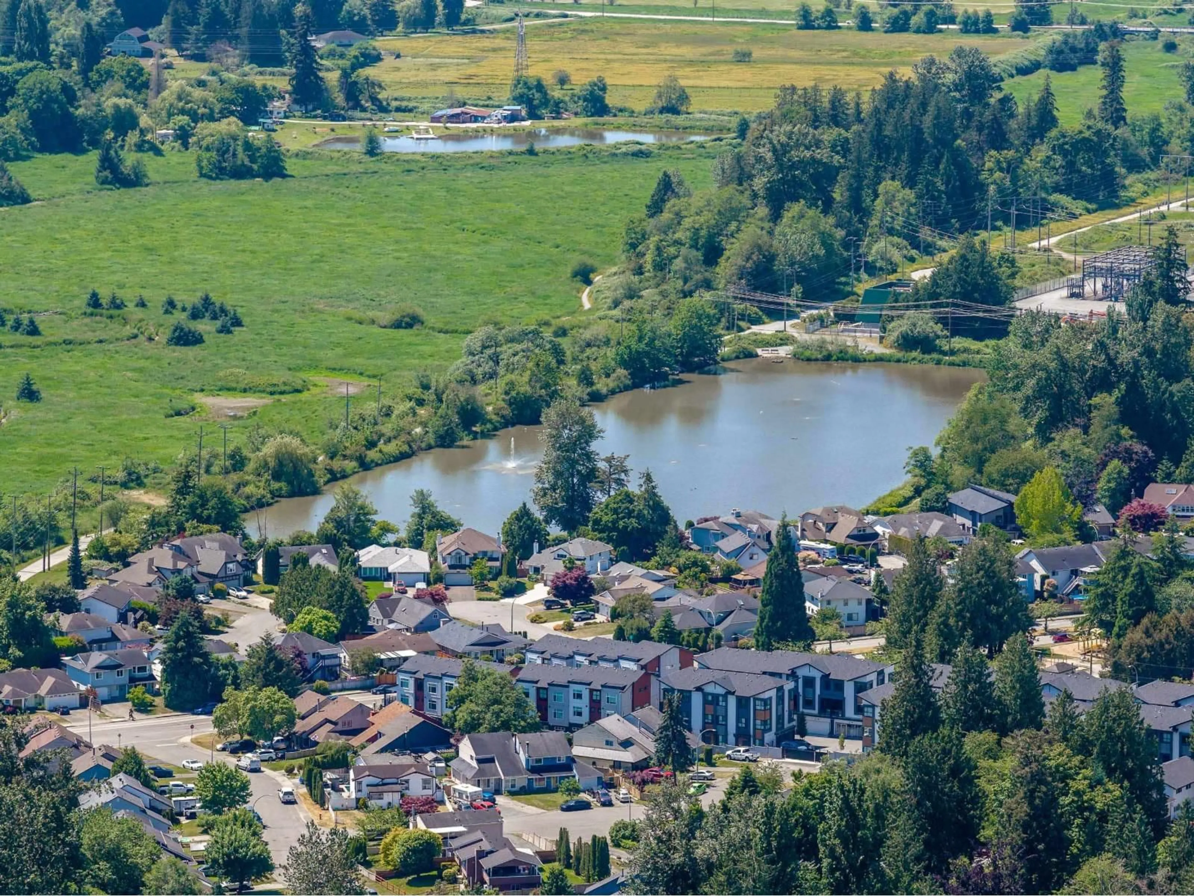 A pic from outside/outdoor area/front of a property/back of a property/a pic from drone, water/lake/river/ocean view for 312 - 5465 201 STREET, Langley British Columbia V3A1P8