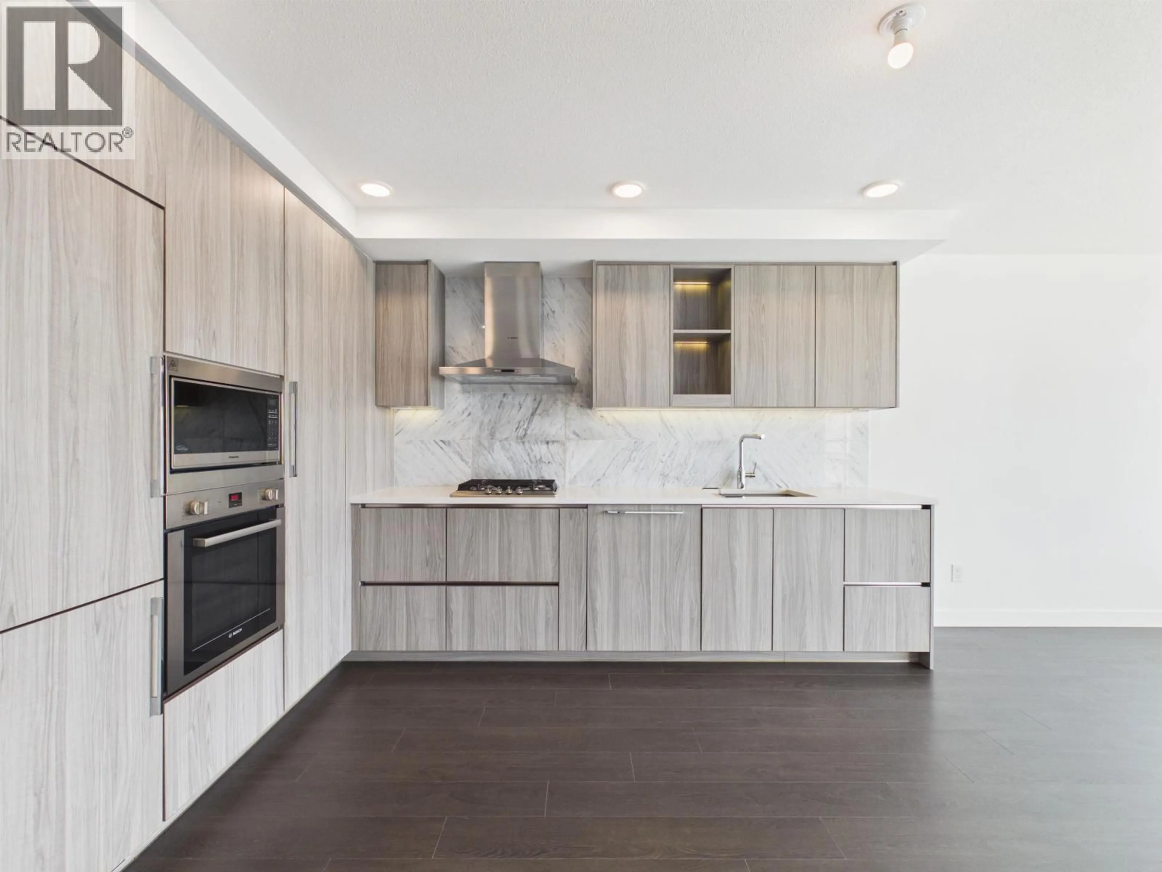 Open concept kitchen, wood/laminate floor for 615 - 3300 KETCHESON ROAD, Richmond British Columbia V6X0S5