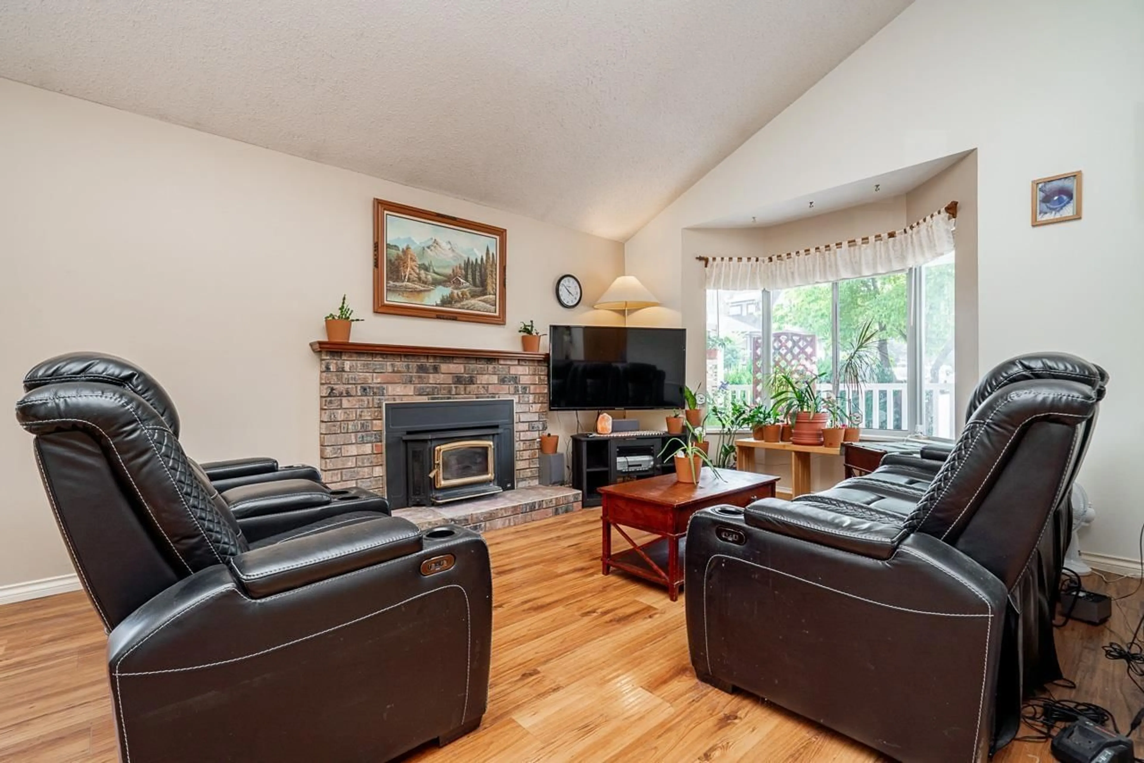 Living room with furniture, wood/laminate floor for 6304 135A STREET, Surrey British Columbia V3X1J7