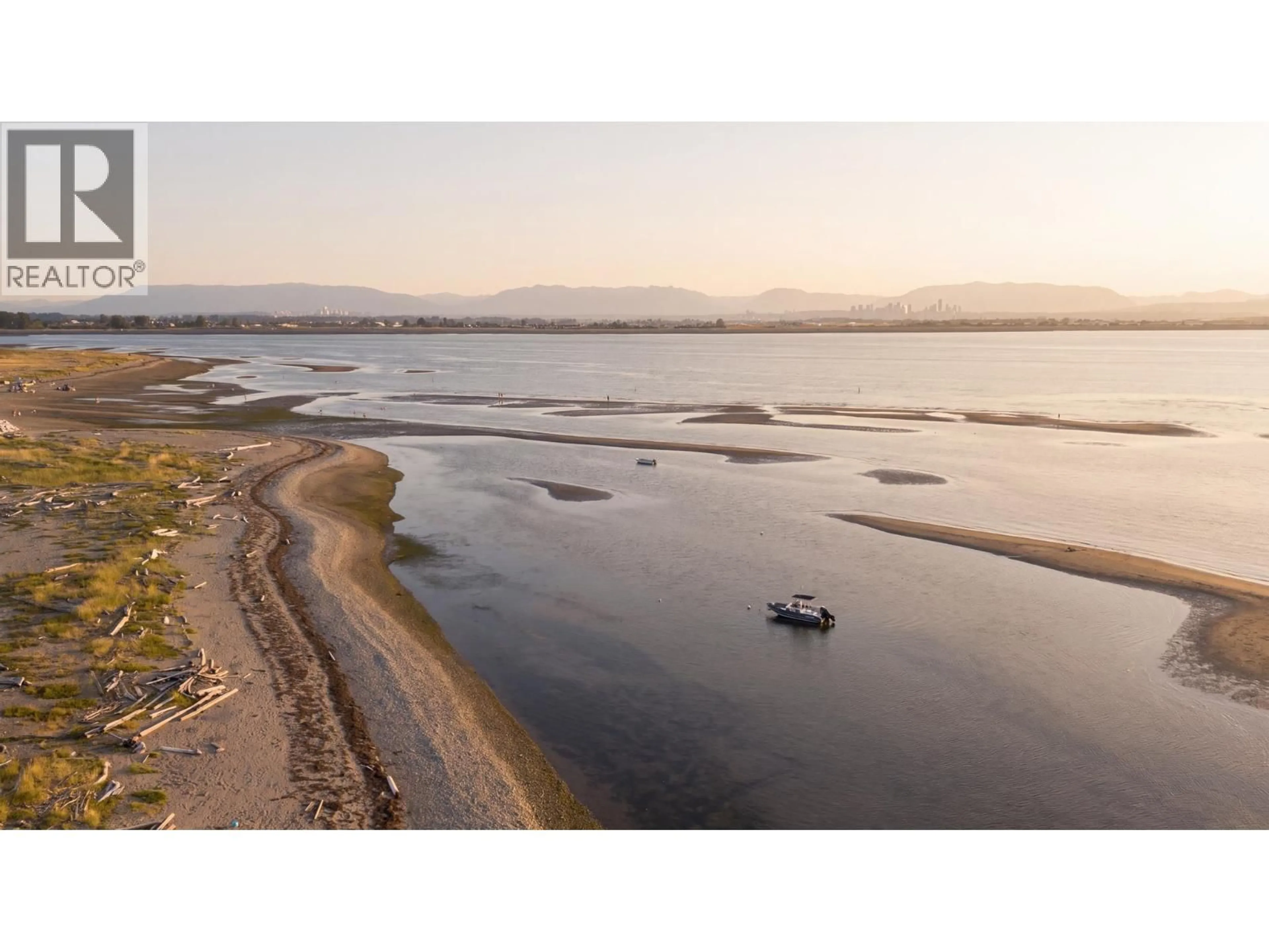 A pic from outside/outdoor area/front of a property/back of a property/a pic from drone, water/lake/river/ocean view for 327 - 6505 3 AVENUE, Tsawwassen British Columbia V4L2N1