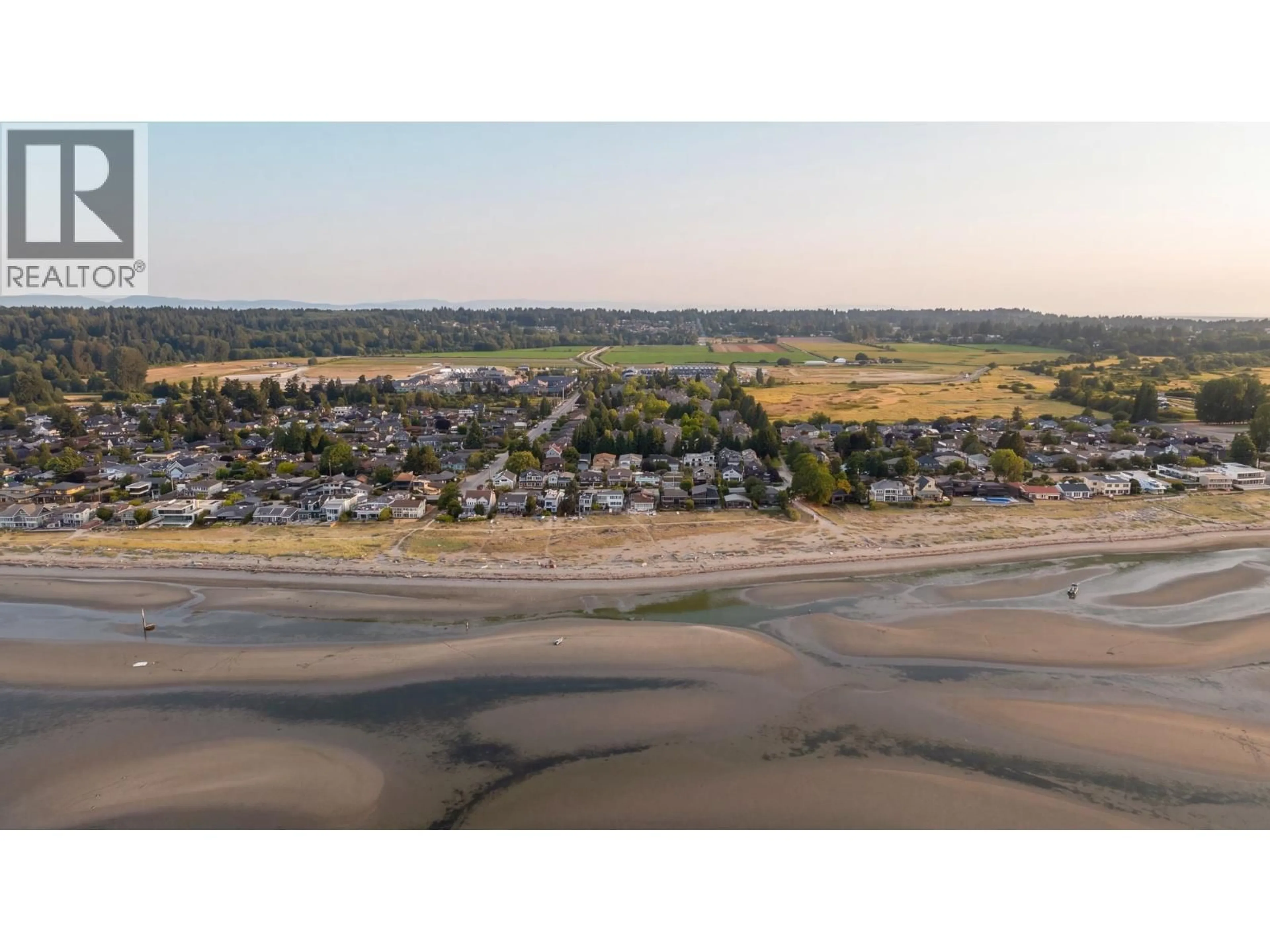 A pic from outside/outdoor area/front of a property/back of a property/a pic from drone, water/lake/river/ocean view for 327 - 6505 3 AVENUE, Tsawwassen British Columbia V4L2N1