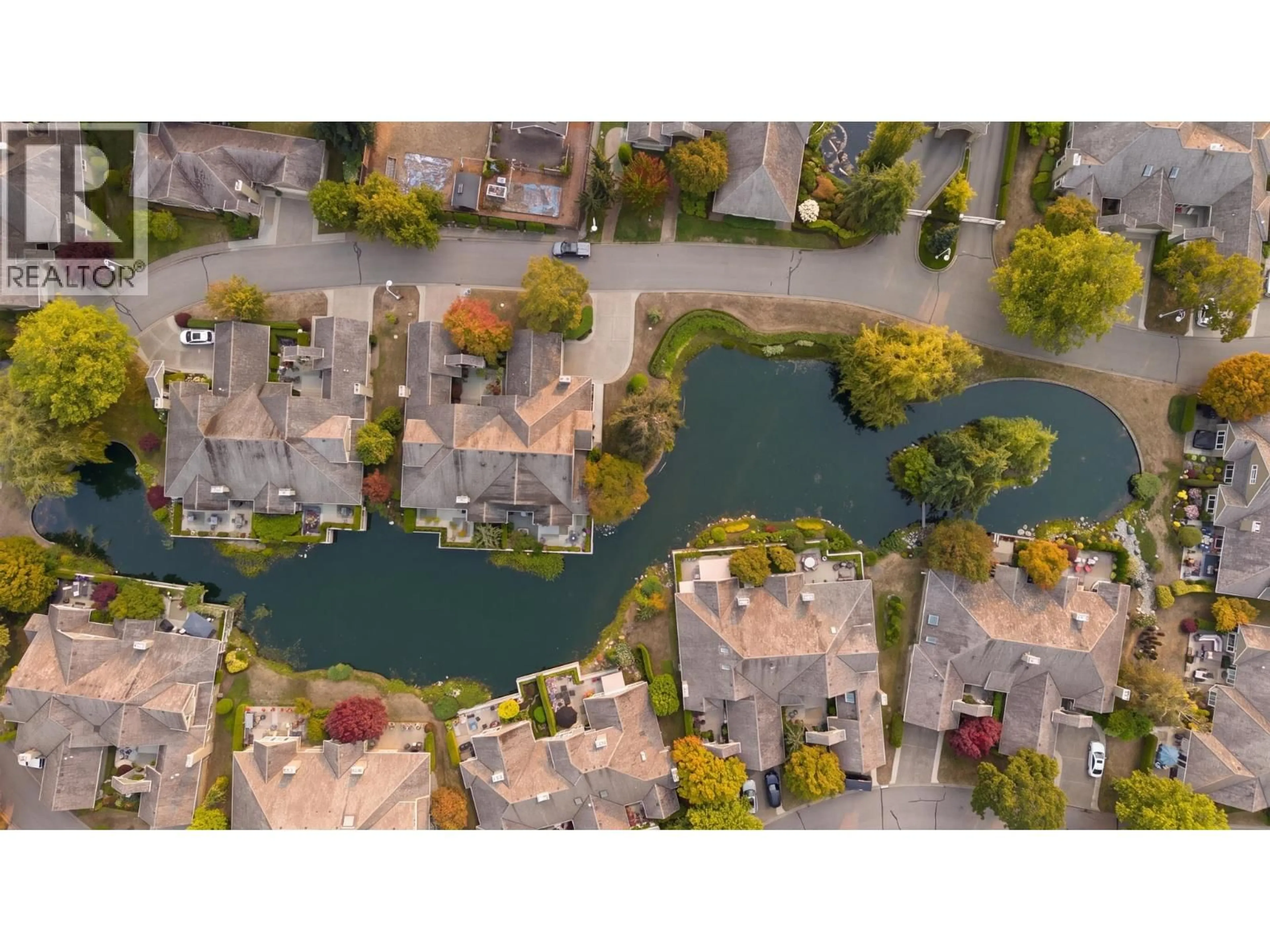 A pic from outside/outdoor area/front of a property/back of a property/a pic from drone, water/lake/river/ocean view for 327 - 6505 3 AVENUE, Tsawwassen British Columbia V4L2N1