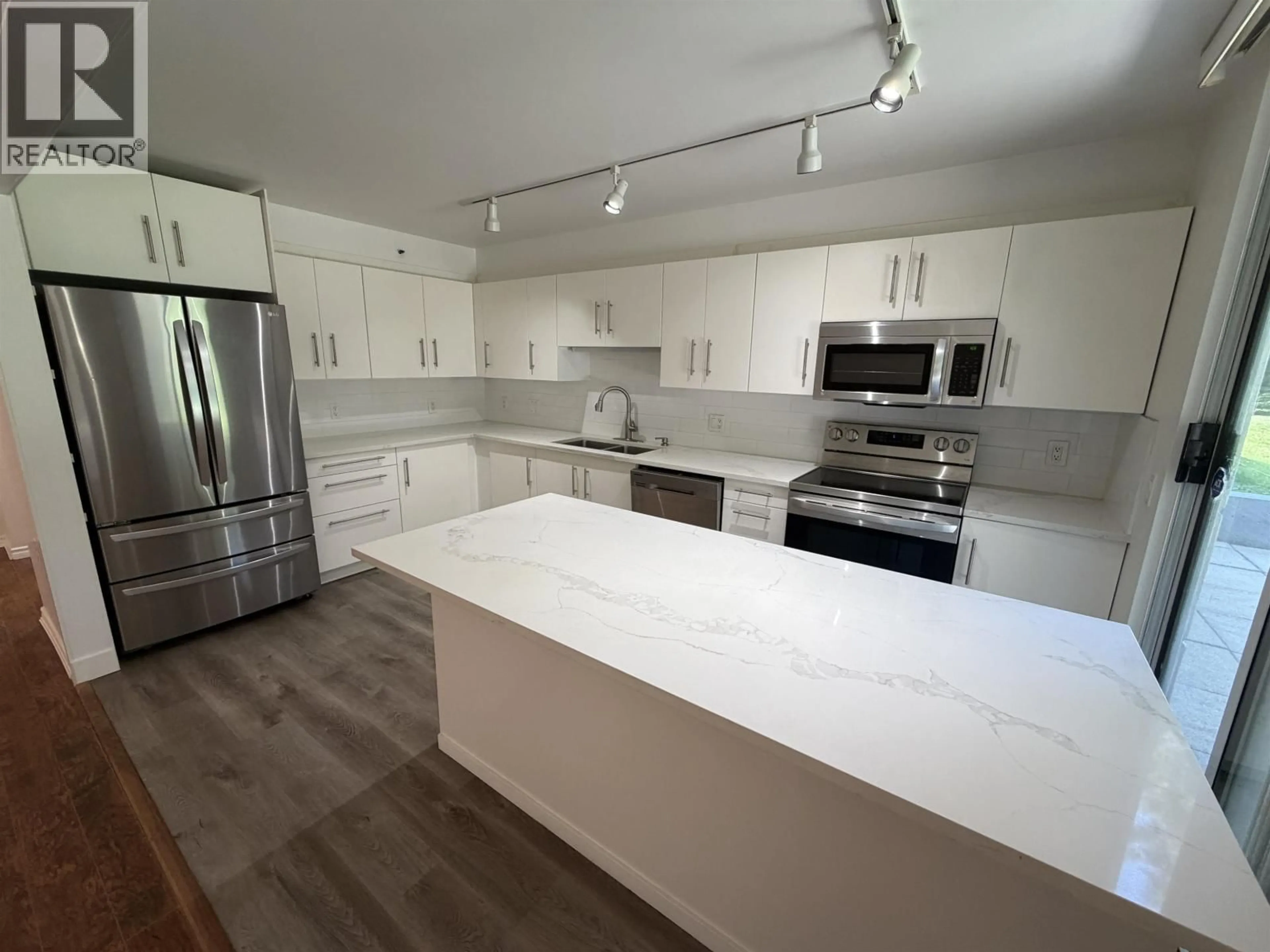 Open concept kitchen, unknown for 104 - 555 AUSTIN AVENUE, Coquitlam British Columbia V3K6R8