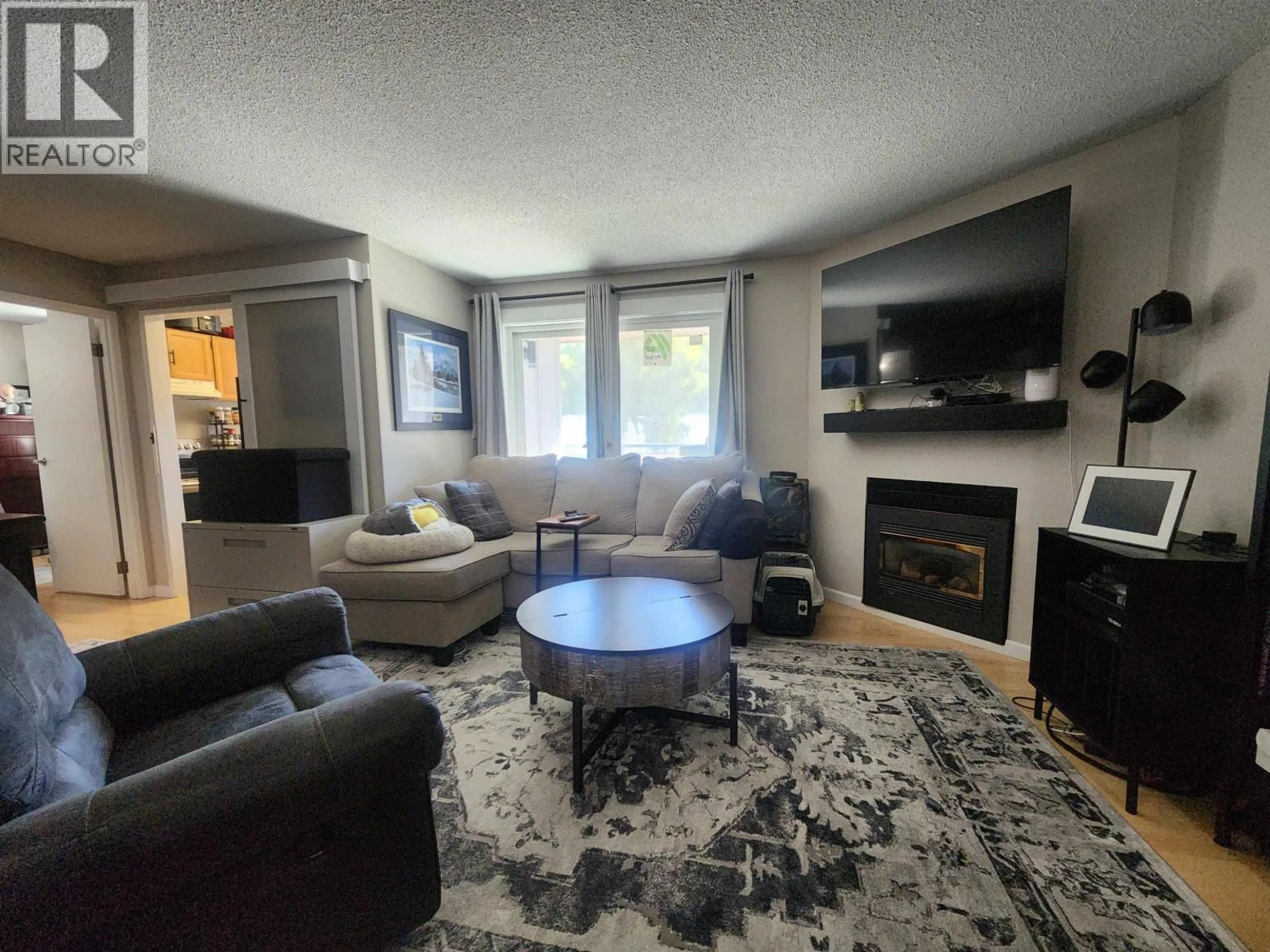 Living room with furniture, unknown for 202 - 3033 OSPIKA BOULEVARD, Prince George British Columbia V2N4L5