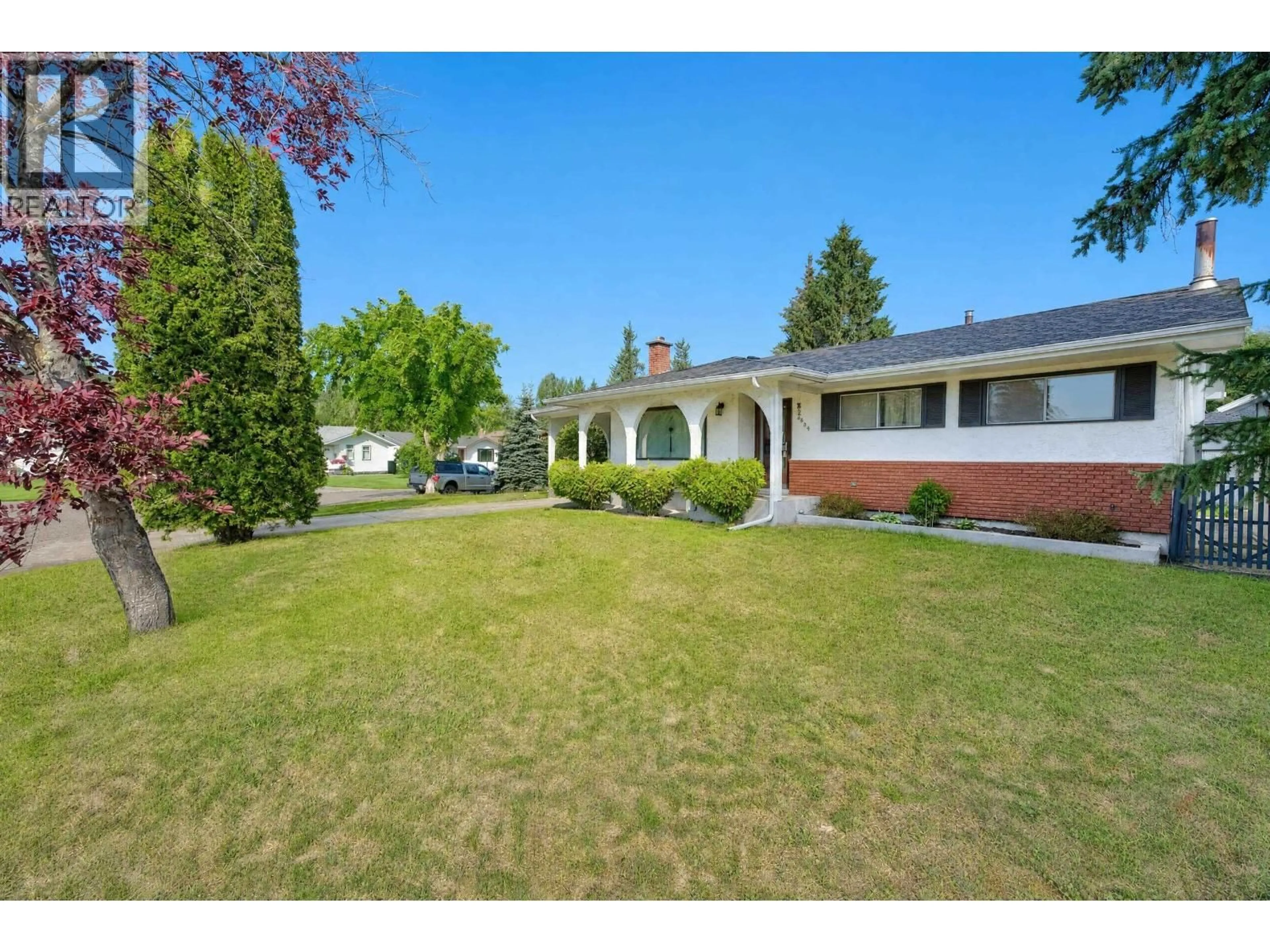 A pic from outside/outdoor area/front of a property/back of a property/a pic from drone, street for 2460 DEVONSHIRE CRESCENT, Prince George British Columbia V2N1C8