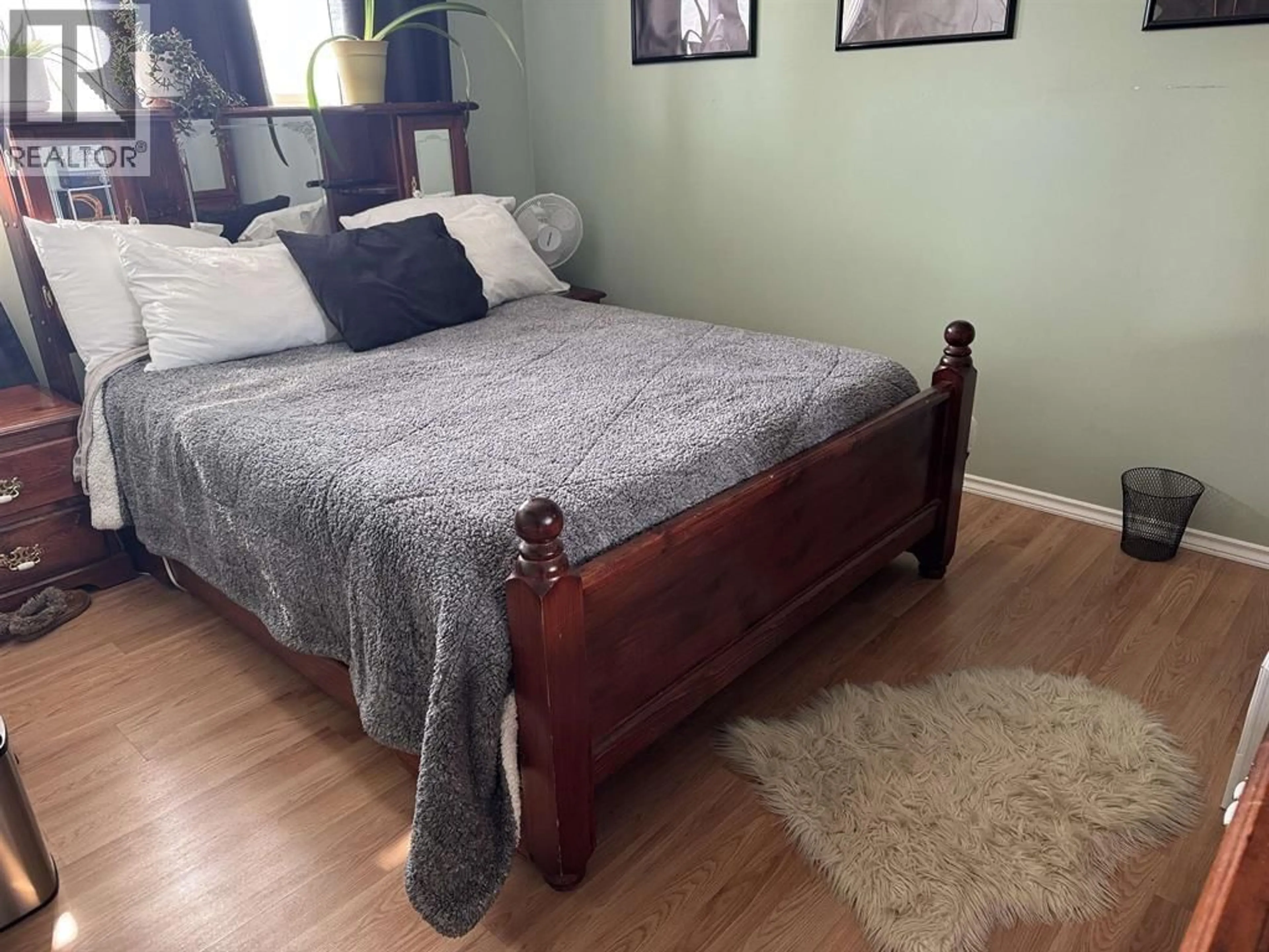Bedroom with bed, wood/laminate floor for 13 MANSON CRESCENT, Mackenzie British Columbia V0J2C0