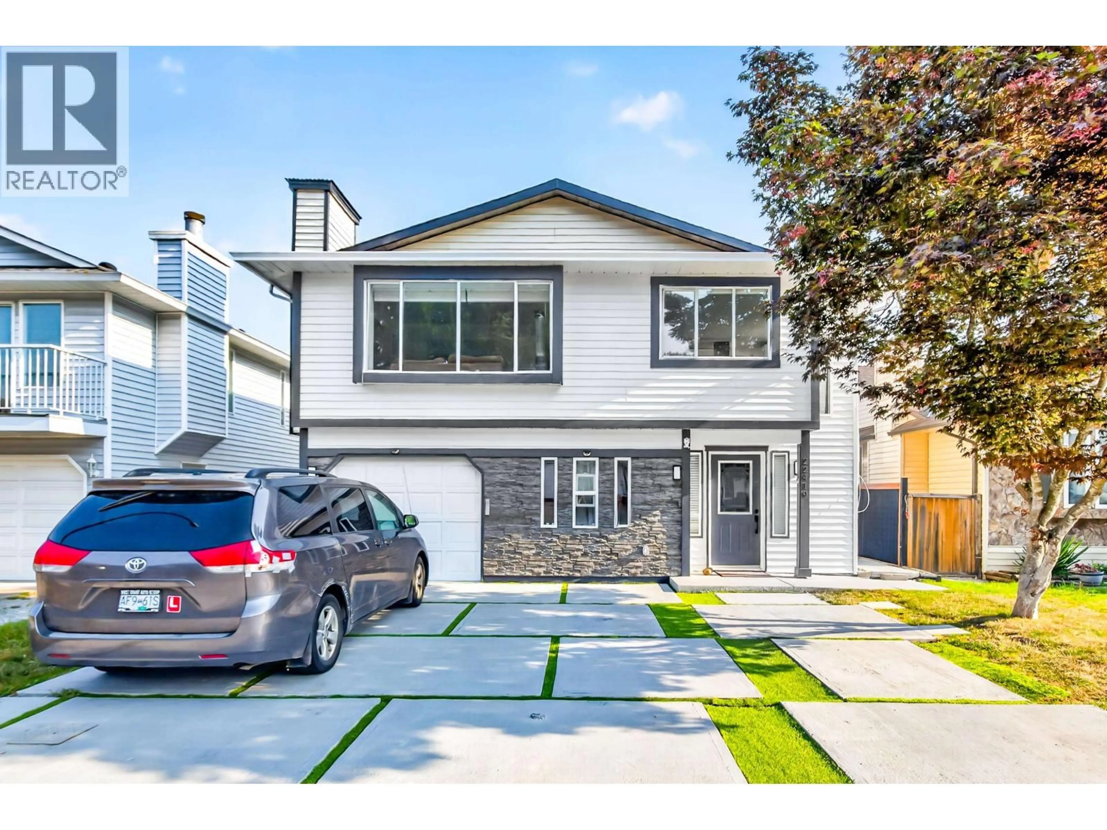 Home with vinyl exterior material, street for 22419 125 AVENUE, Maple Ridge British Columbia V2X9N8