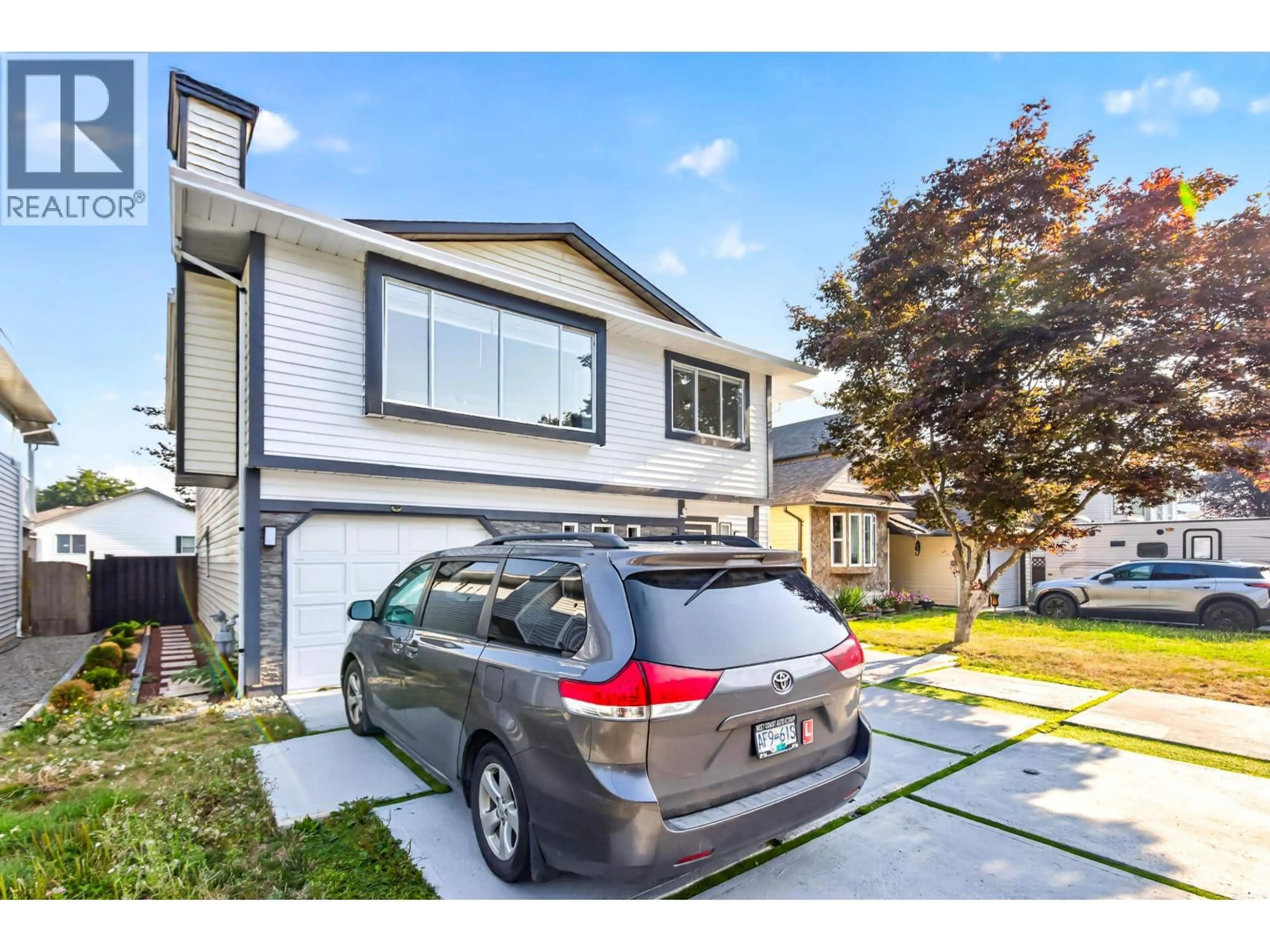Home with vinyl exterior material, street for 22419 125 AVENUE, Maple Ridge British Columbia V2X9N8