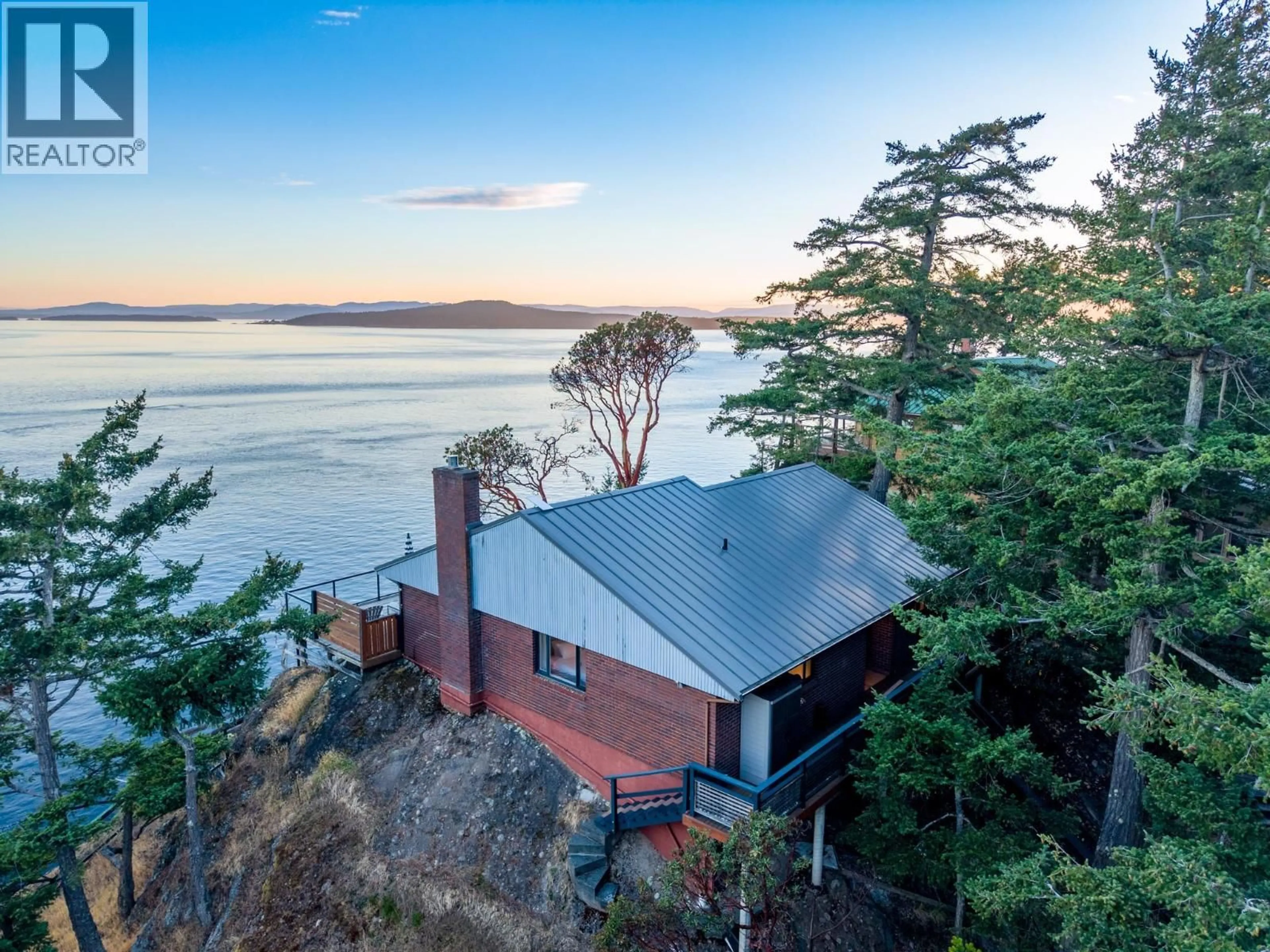 A pic from outside/outdoor area/front of a property/back of a property/a pic from drone, water/lake/river/ocean view for 7918 SWANSON VIEW DRIVE, Pender Island British Columbia V0N2M2