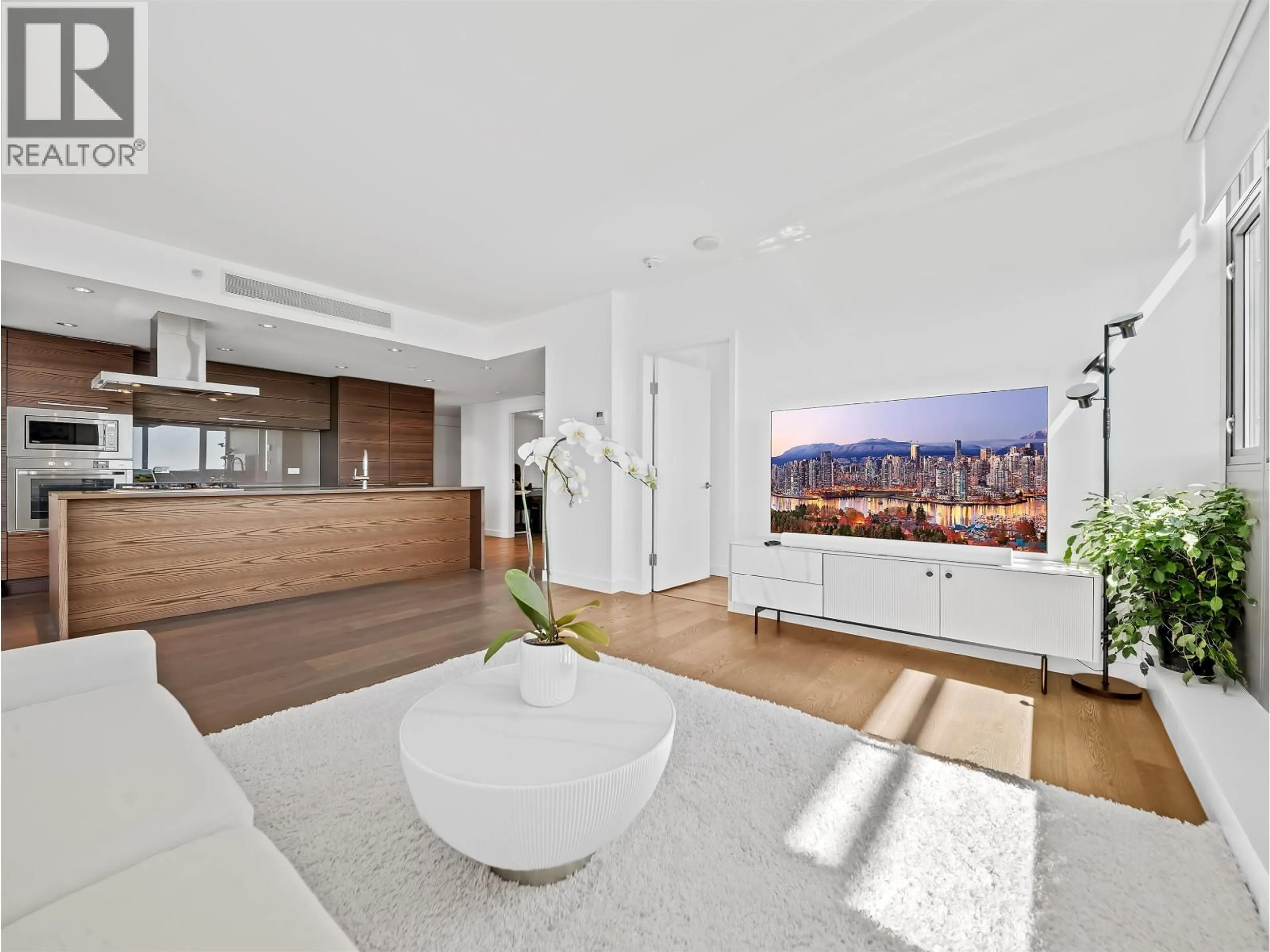 Living room with furniture, wood/laminate floor for 1701 - 5782 BERTON AVENUE, Vancouver British Columbia V6S0C1