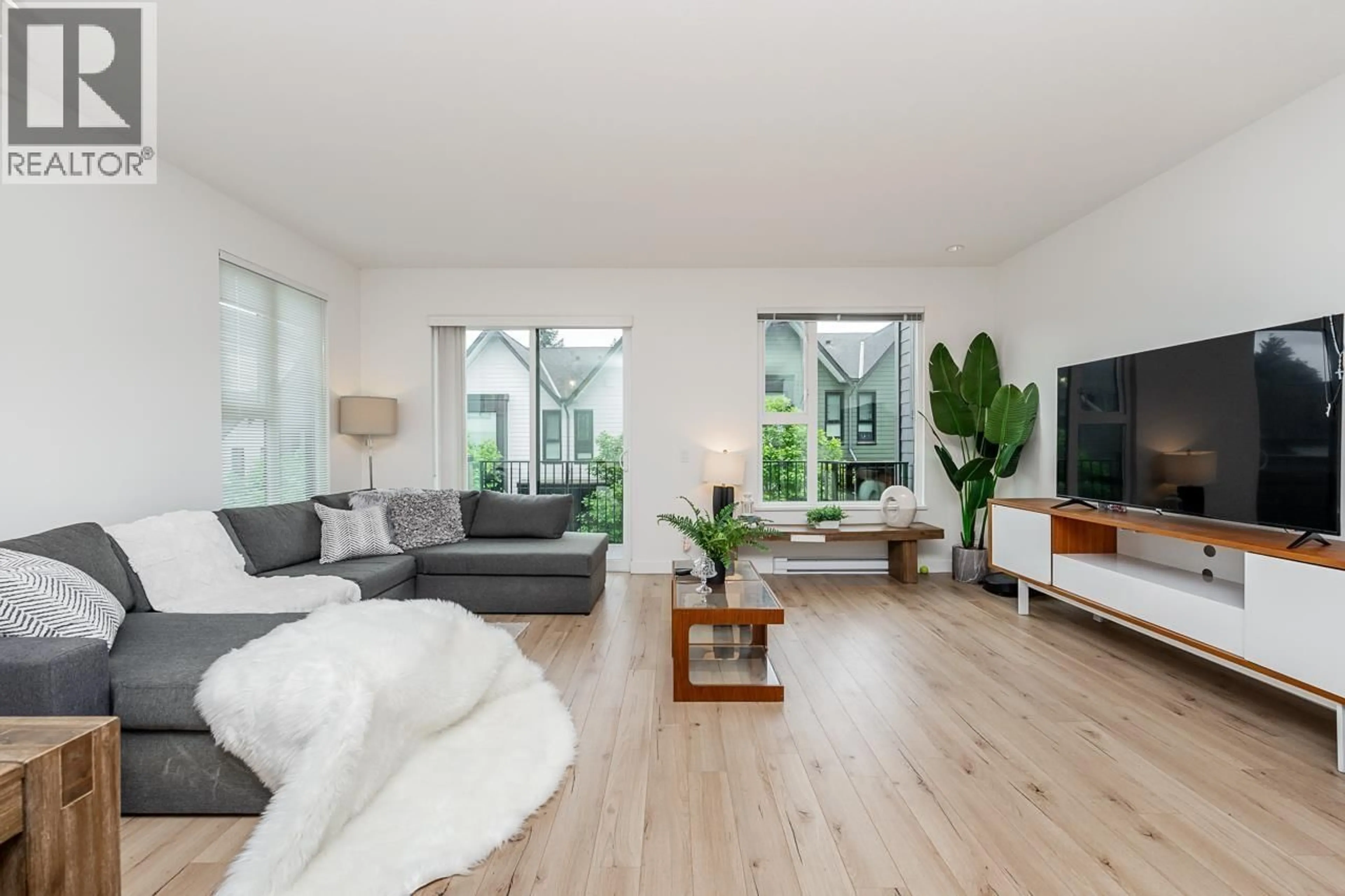 Living room with furniture, wood/laminate floor for 13 - 1228 HUDSON STREET, Coquitlam British Columbia V3B0R3