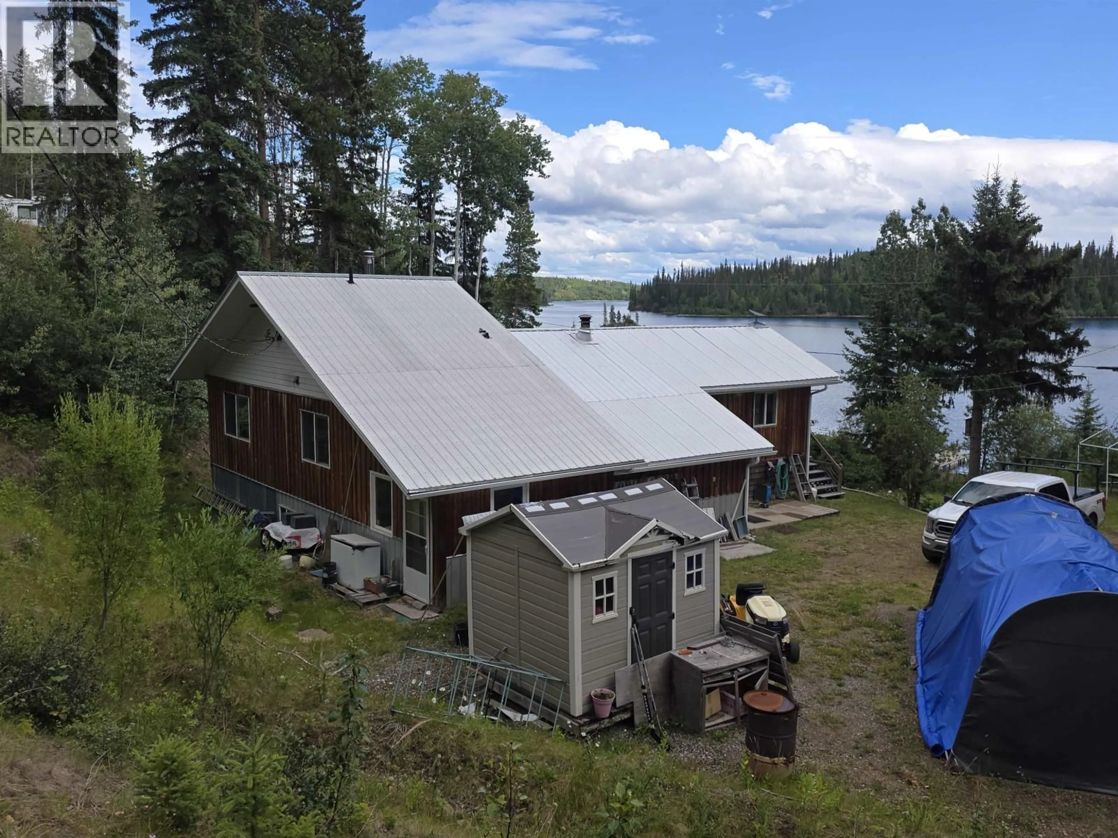 A pic from outside/outdoor area/front of a property/back of a property/a pic from drone, water/lake/river/ocean view for 44856 COLLEYMOUNT ROAD, Burns Lake British Columbia V0J1E2